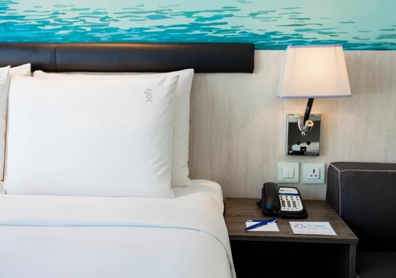 Bed in Holiday Inn Express Pattaya Central by IHG