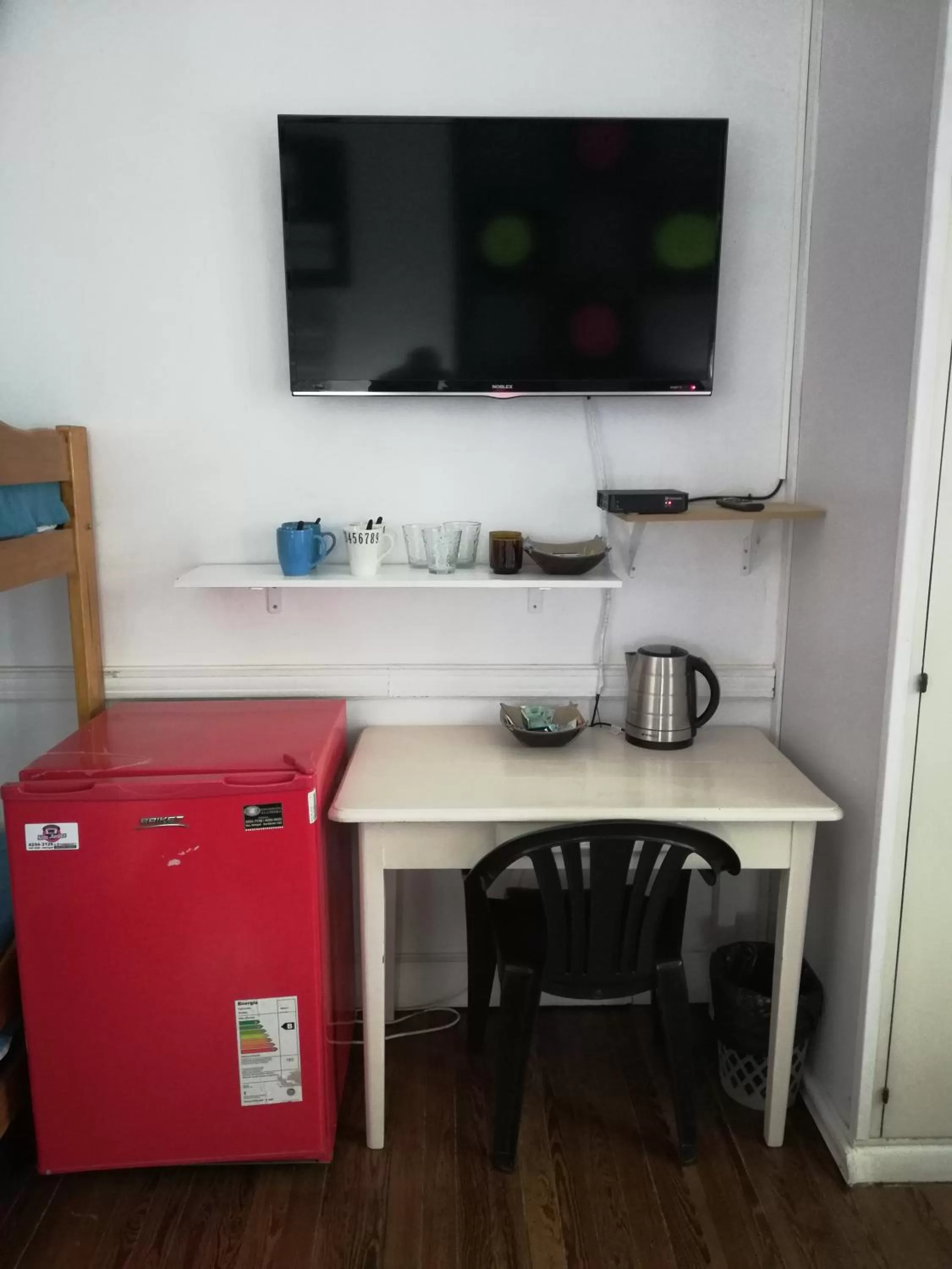 TV/Entertainment Center in Casablanca Boutique Hotel Adrogué