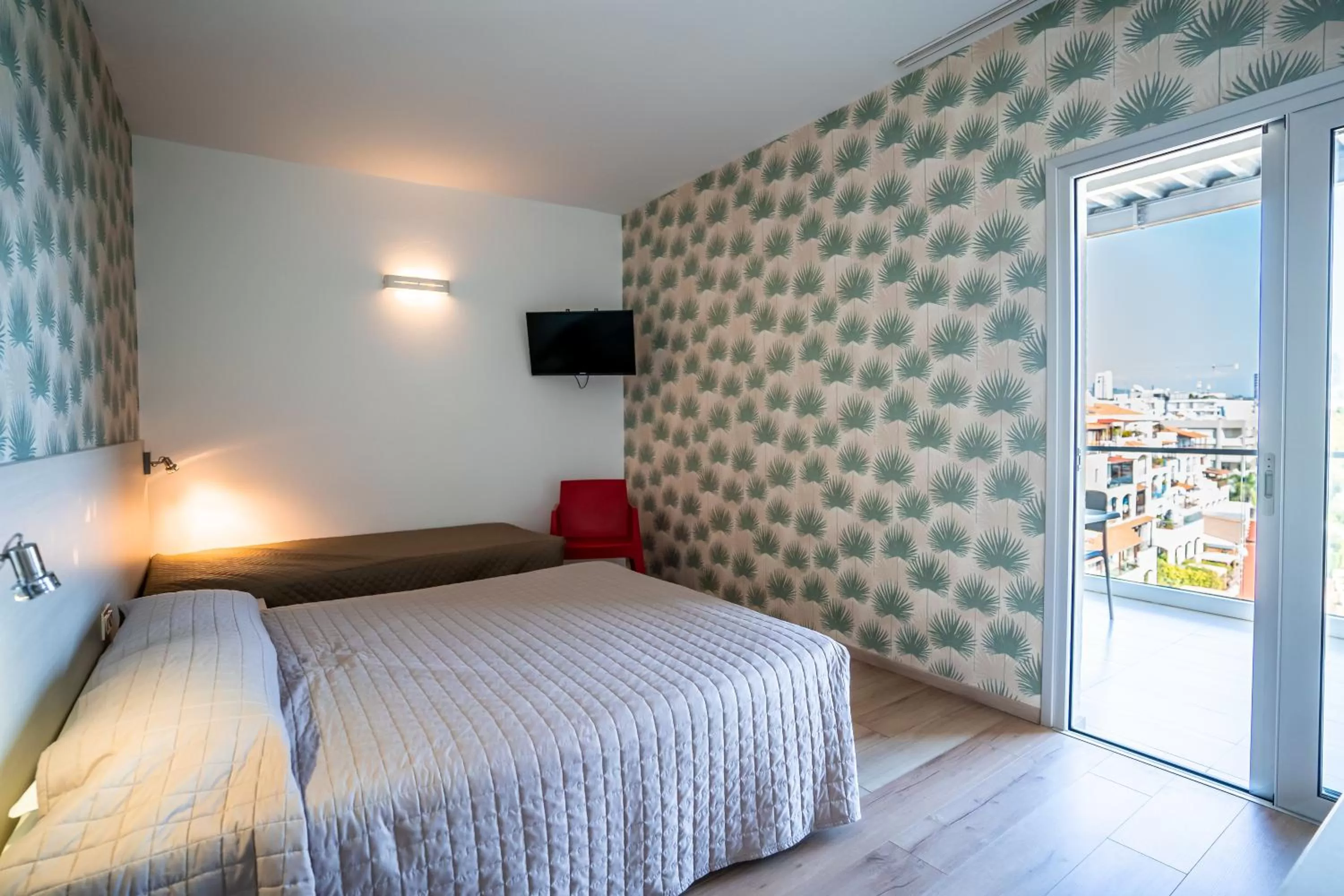 Bed in Harmony Bay Hotel