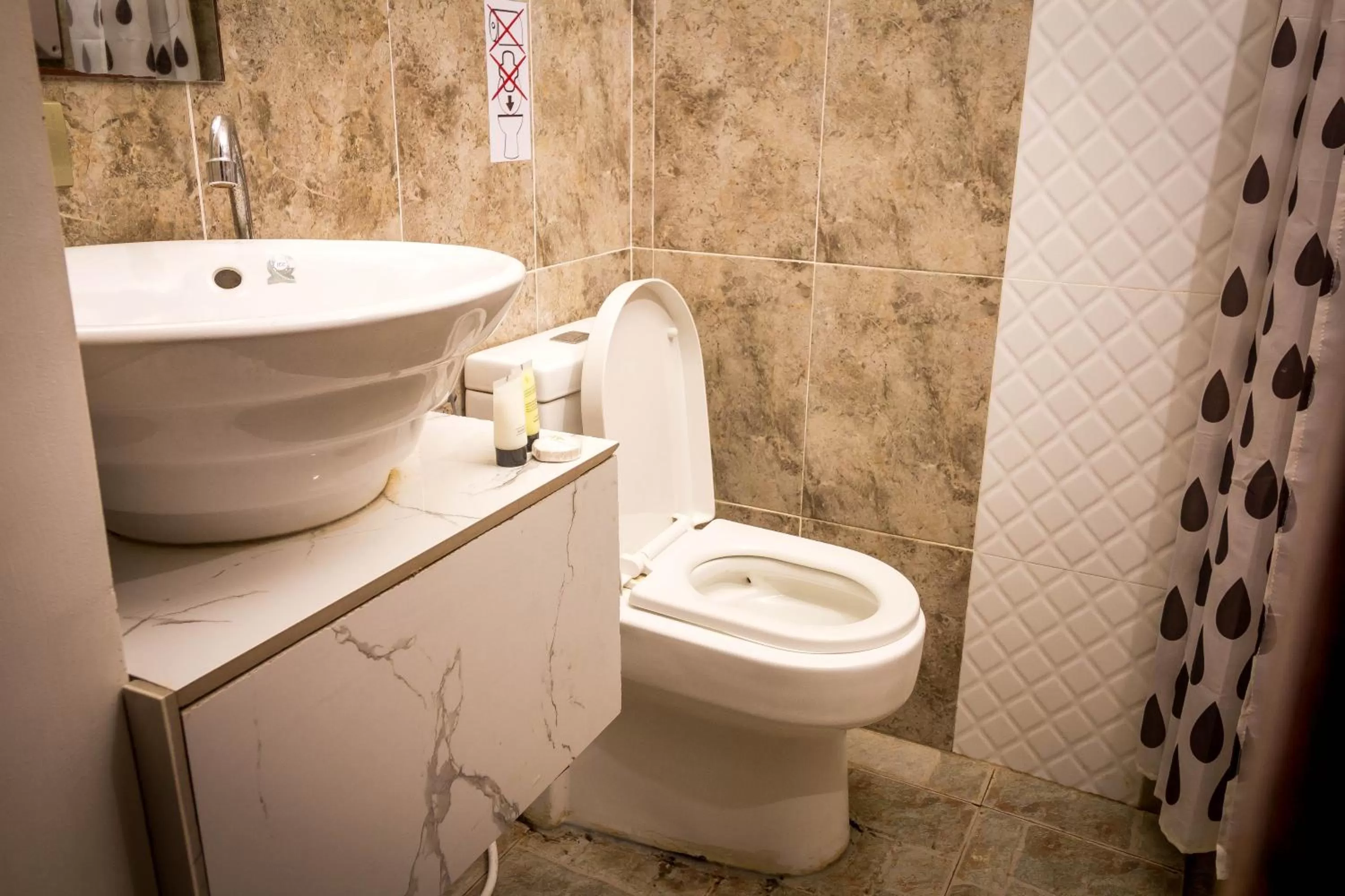 Toilet in El Nido Royal Palm Inn