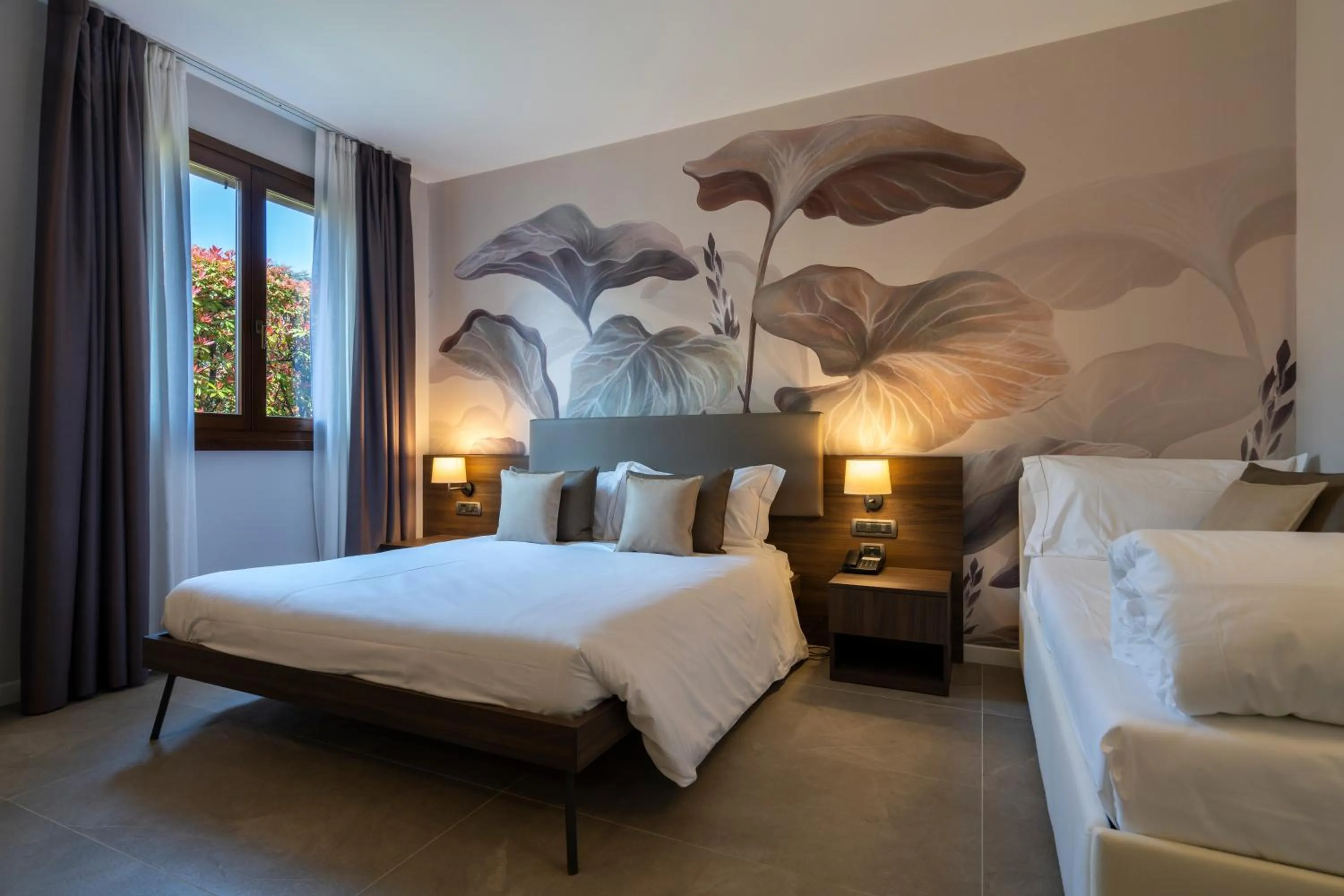 Bed in Ulivi Hotel & Residence