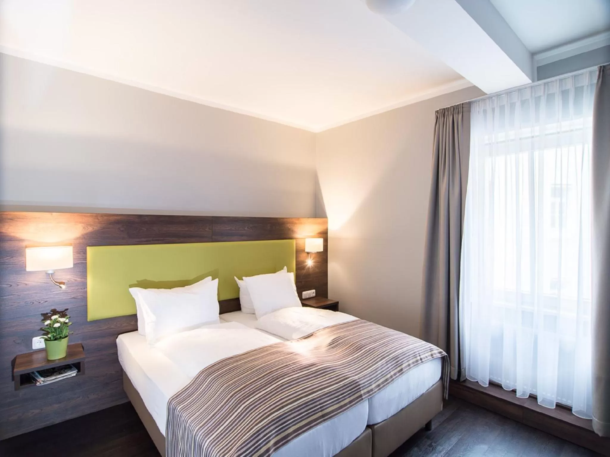 Bed in BATU Apart Hotel