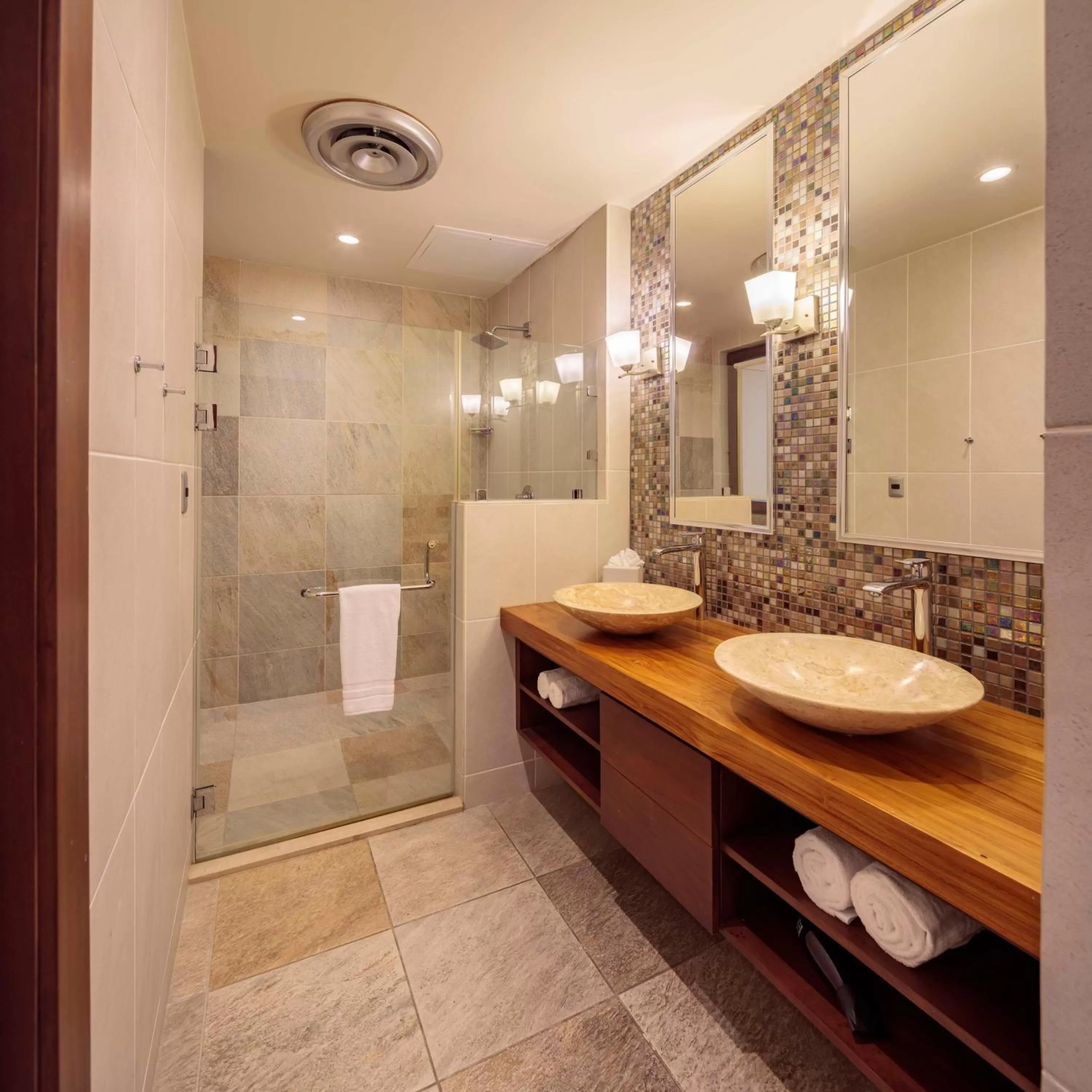 Bathroom in Indura Beach & Golf Resort Curio Collection By Hilton