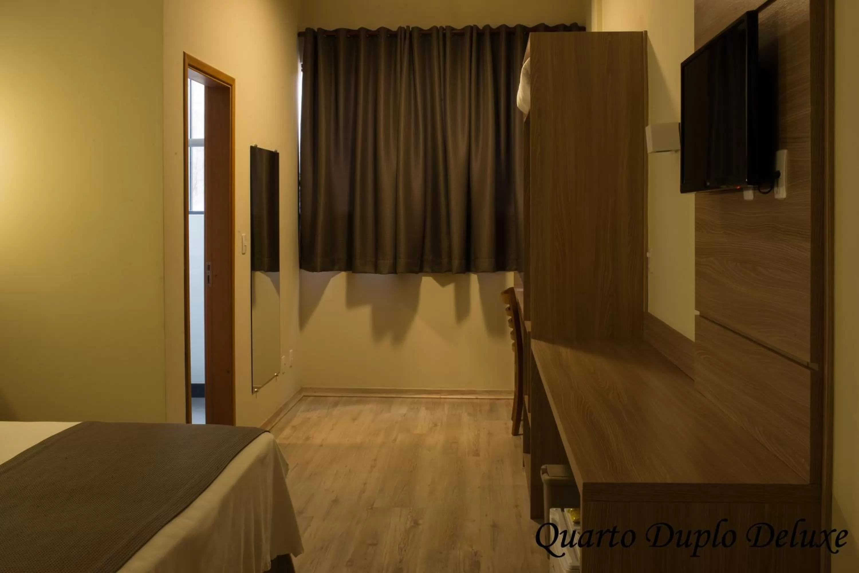 Bed in Minas Platinum Hotel & Convention