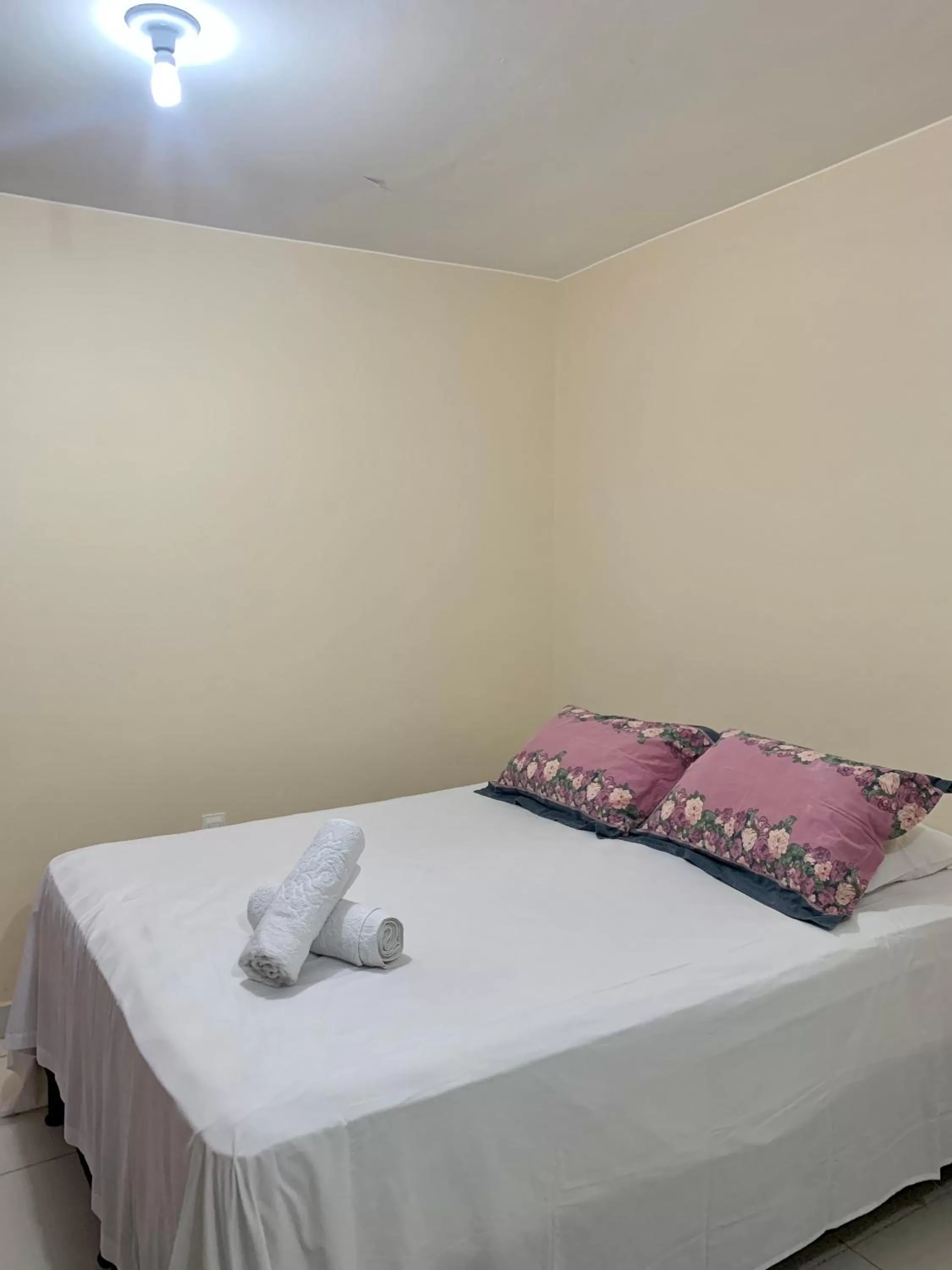 Bed in Pousada Jardim Brasília