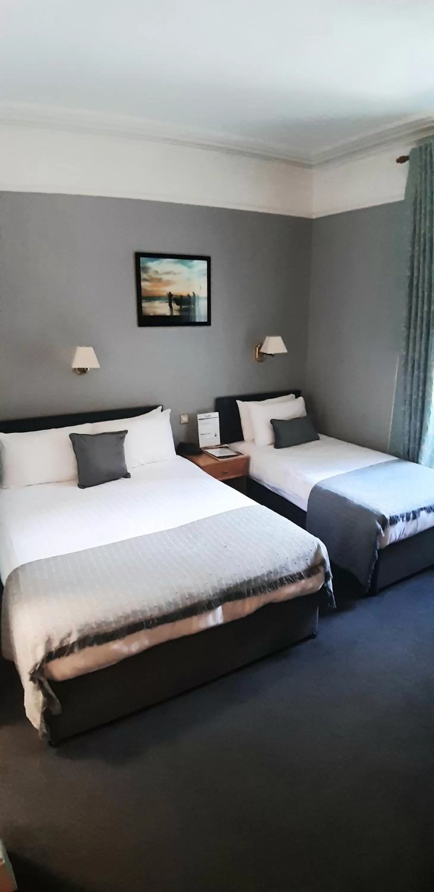 Bed in Commodore Hotel