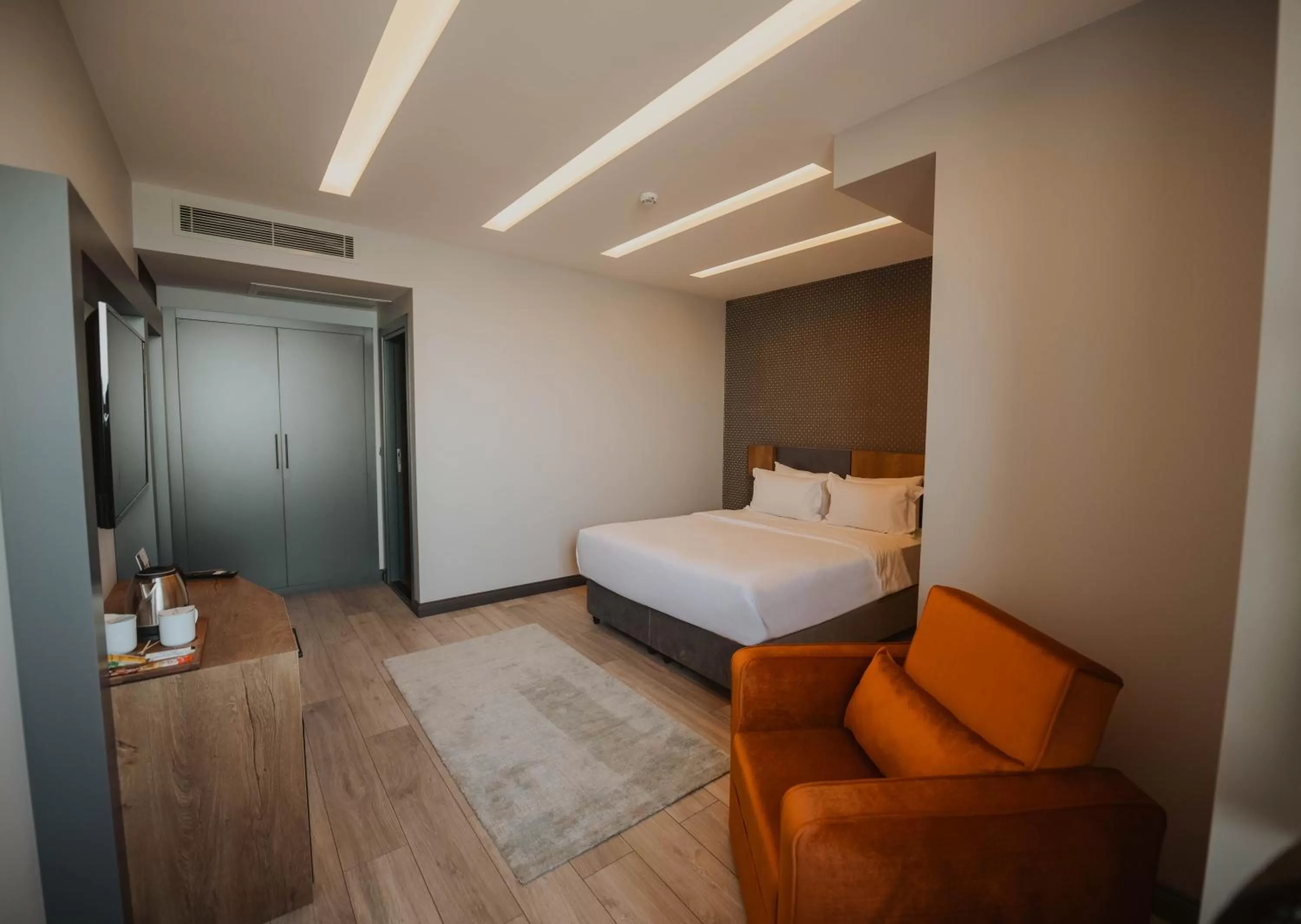 Bed in Peerless Villas Hotel