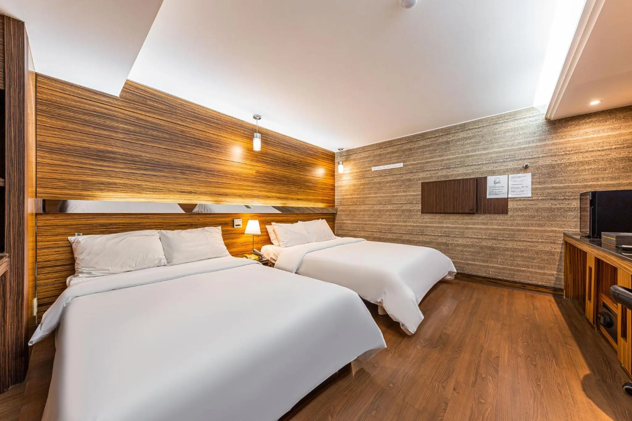 Bed in Friendly DH Naissance Hotel by Mindrum Group