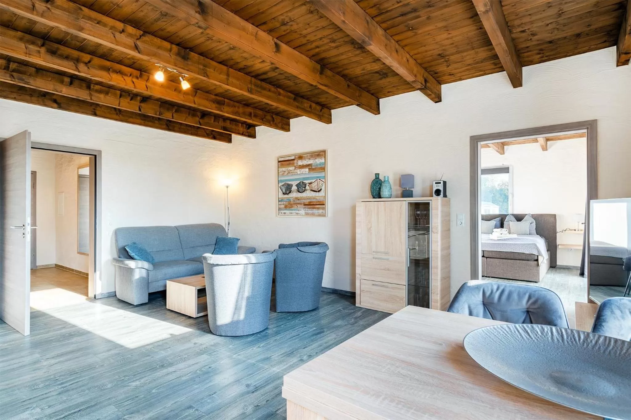 Bed, Seating Area in Villa Moorstern