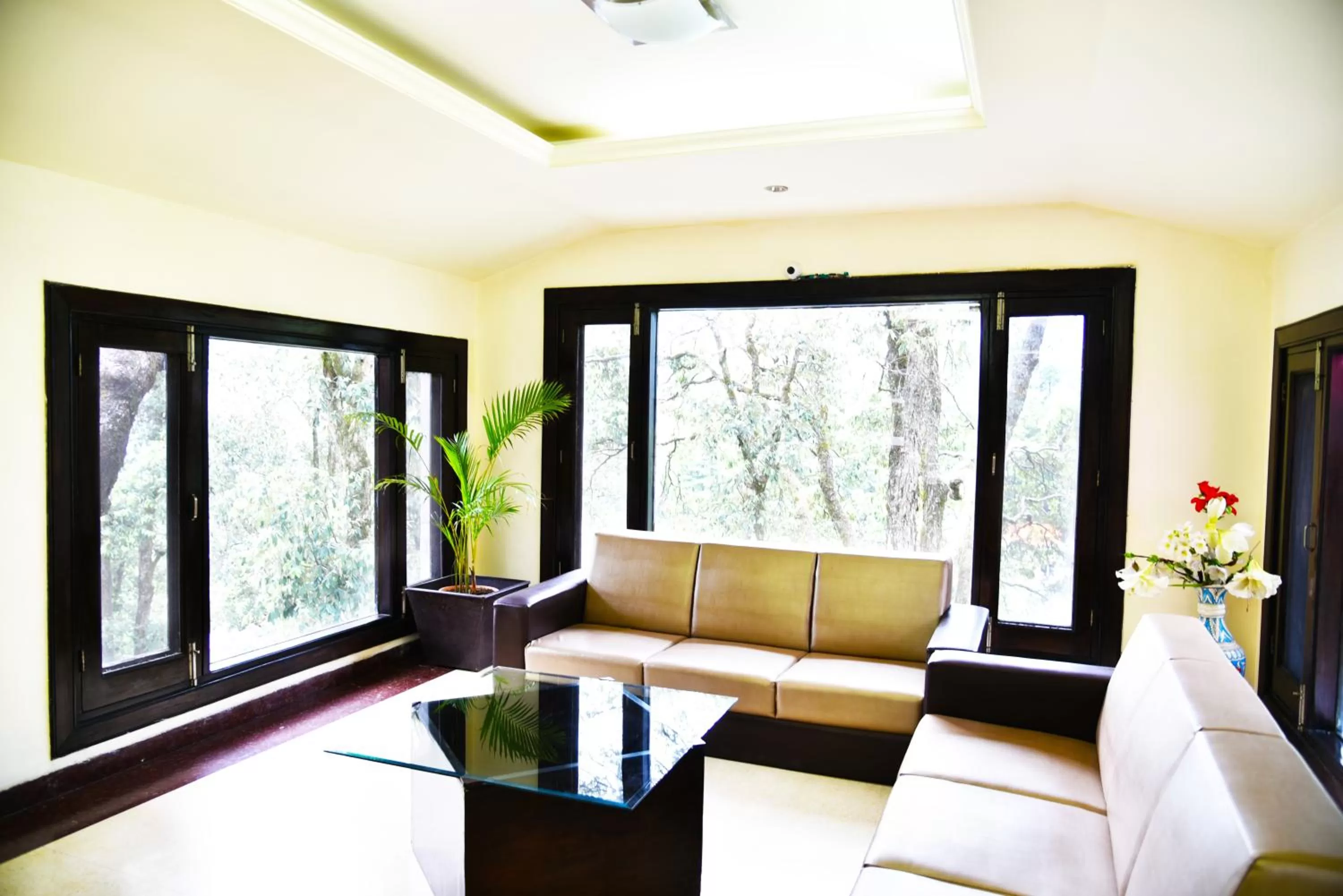 Seating area in Indraprastha Resort - Centrally Heated Rooms, with Gym, Games & Spa