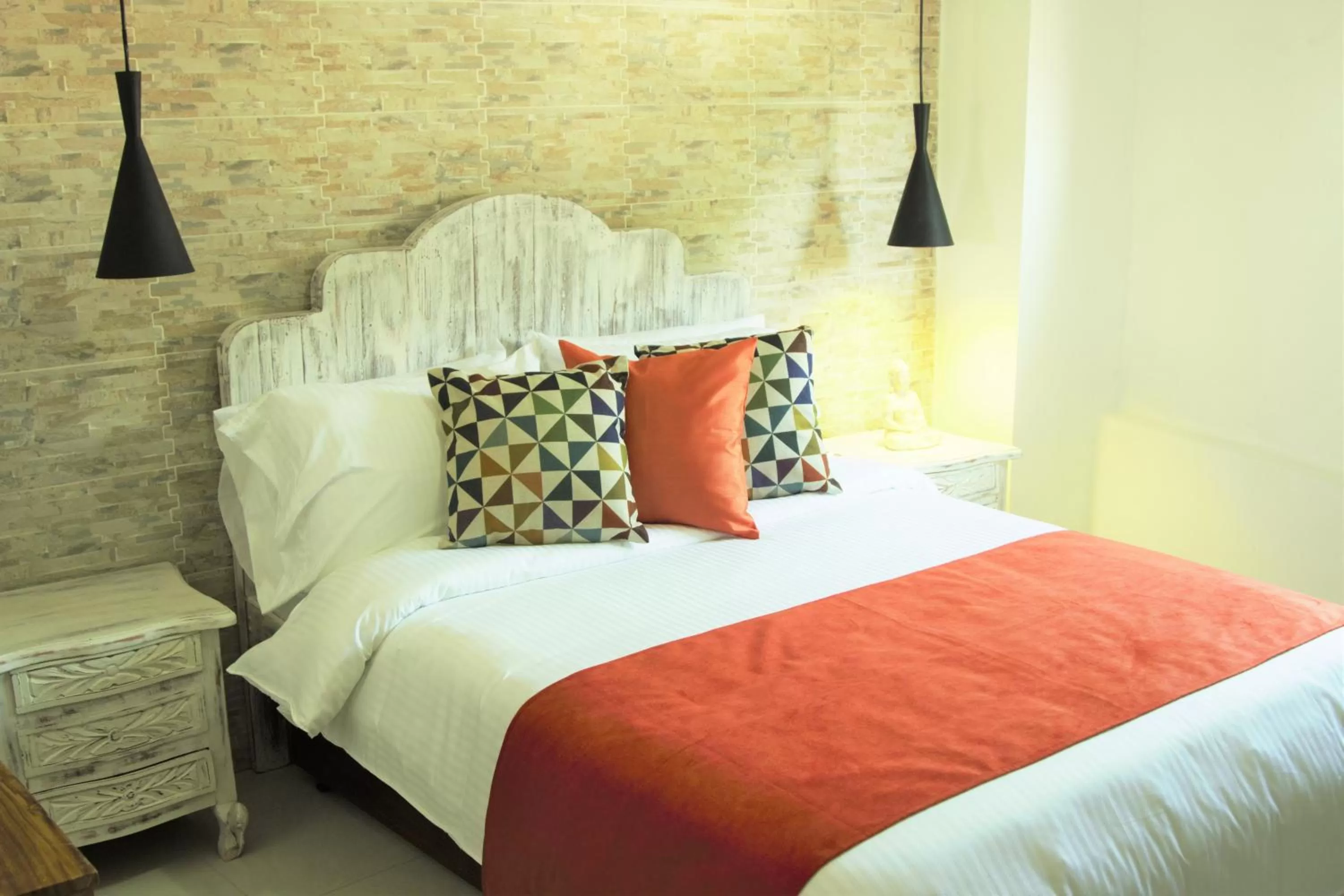 Bed in Voilá Signature Casa Isabel