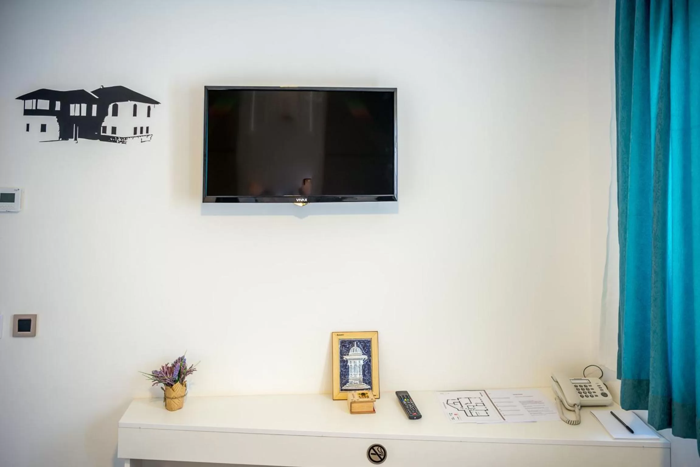 TV and multimedia, TV/Entertainment Center in Heritage Hotel Gate of Sarajevo