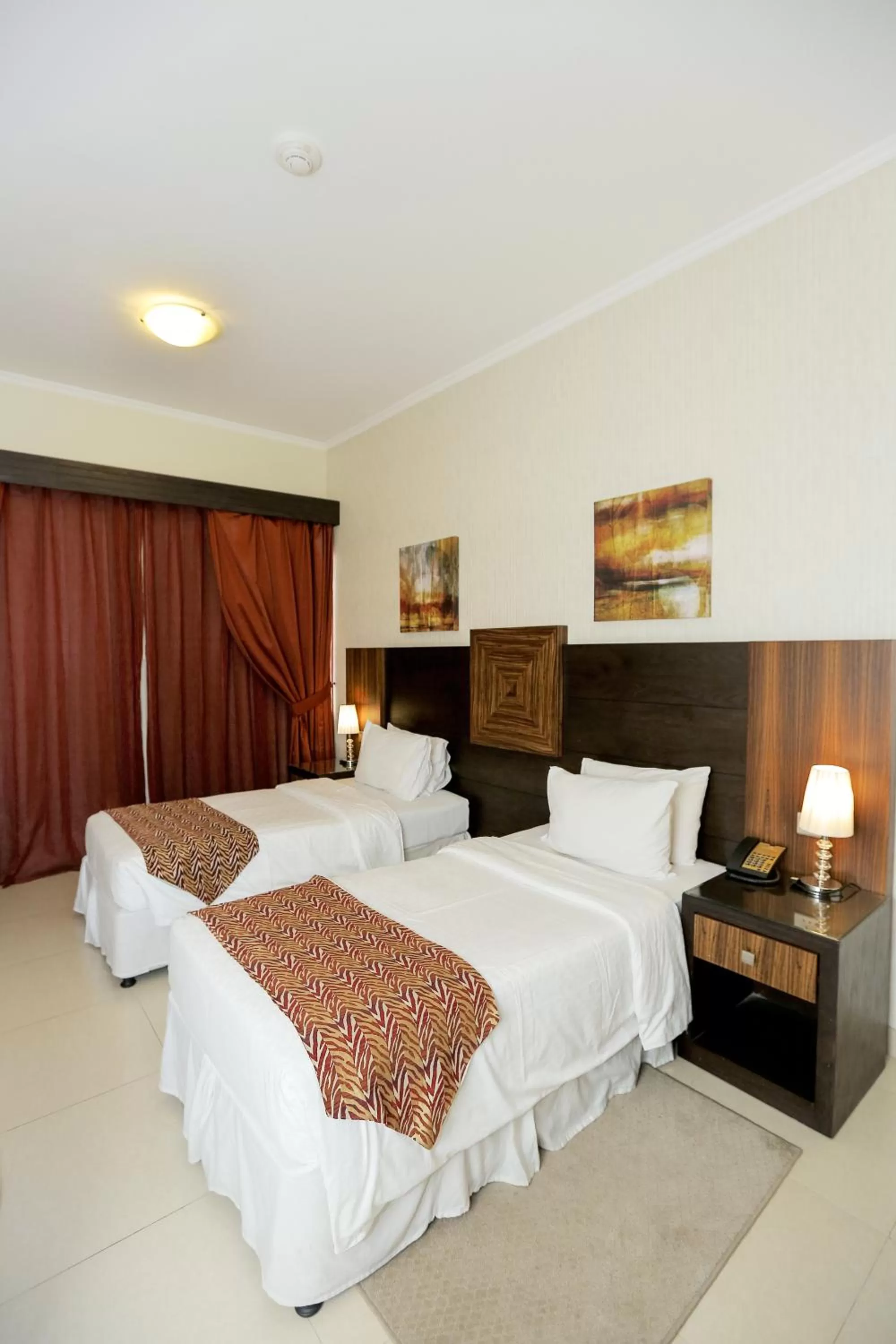 Bed in Ivory Grand Hotel Apartments