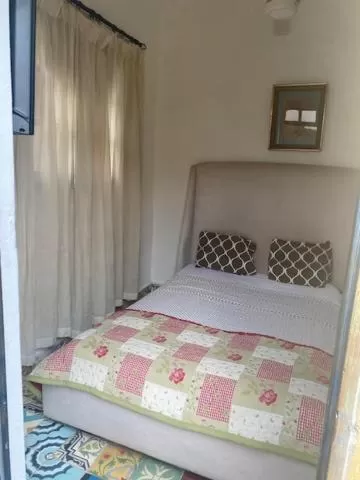 Bed in Chao Mamá Hostal