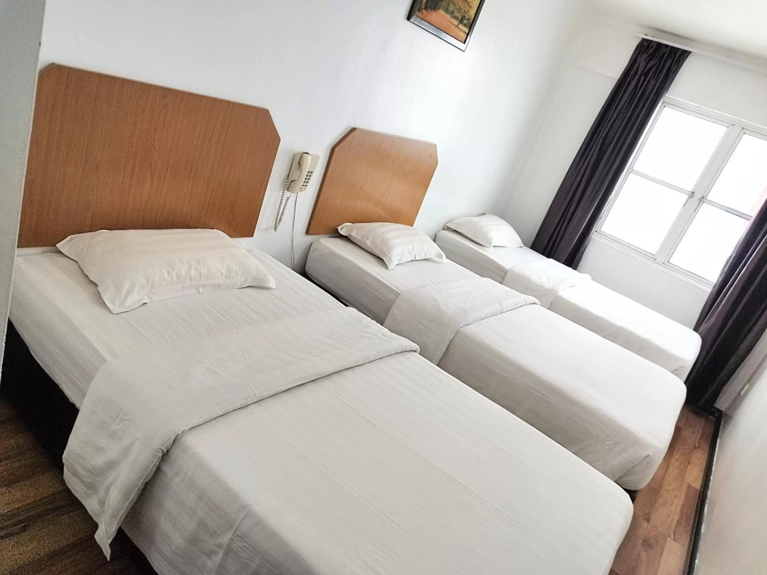 Bed in Marine Bay Hotel