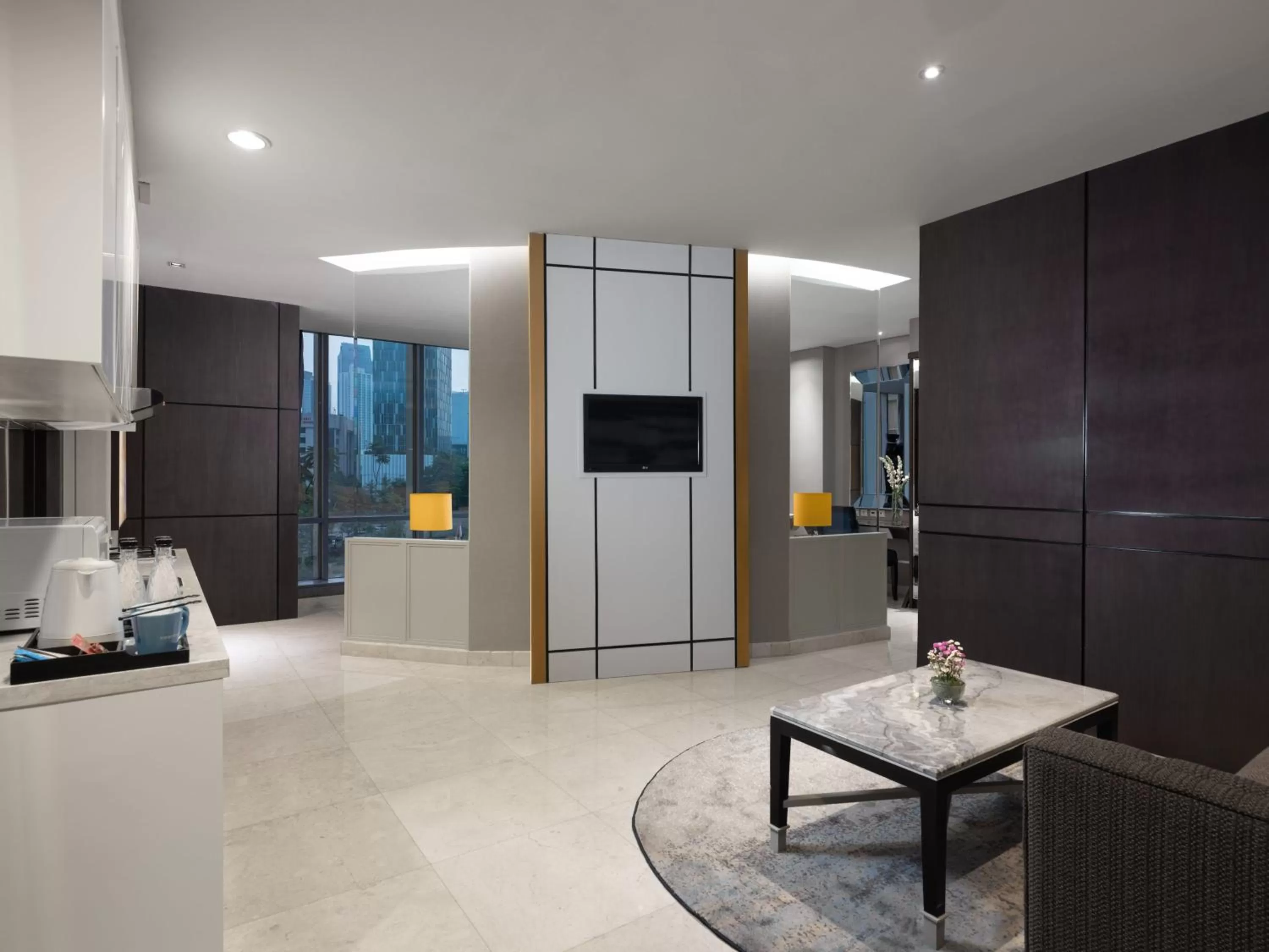 Living room in The Grove Suites by Grand Aston