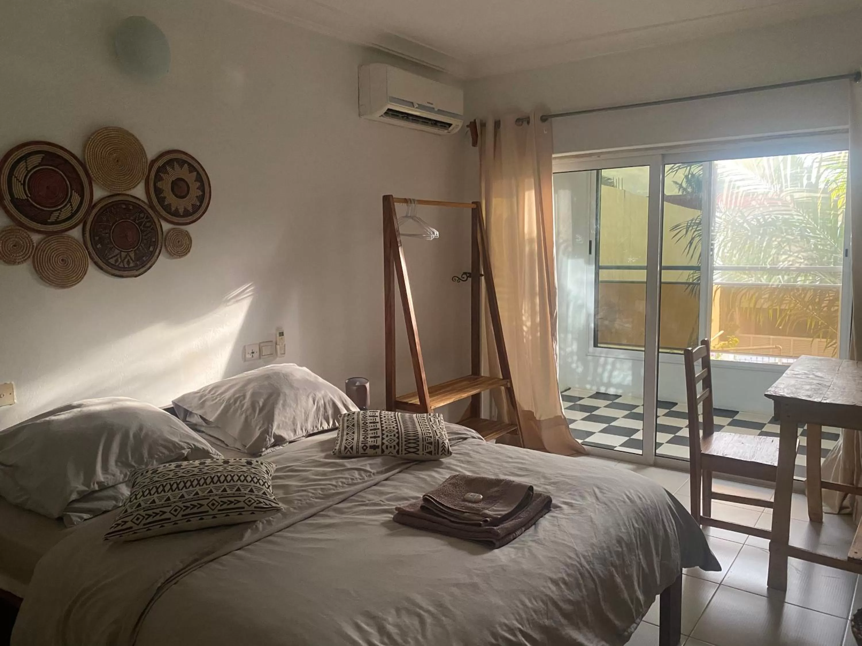 Bed in L'Oasis Guesthouse