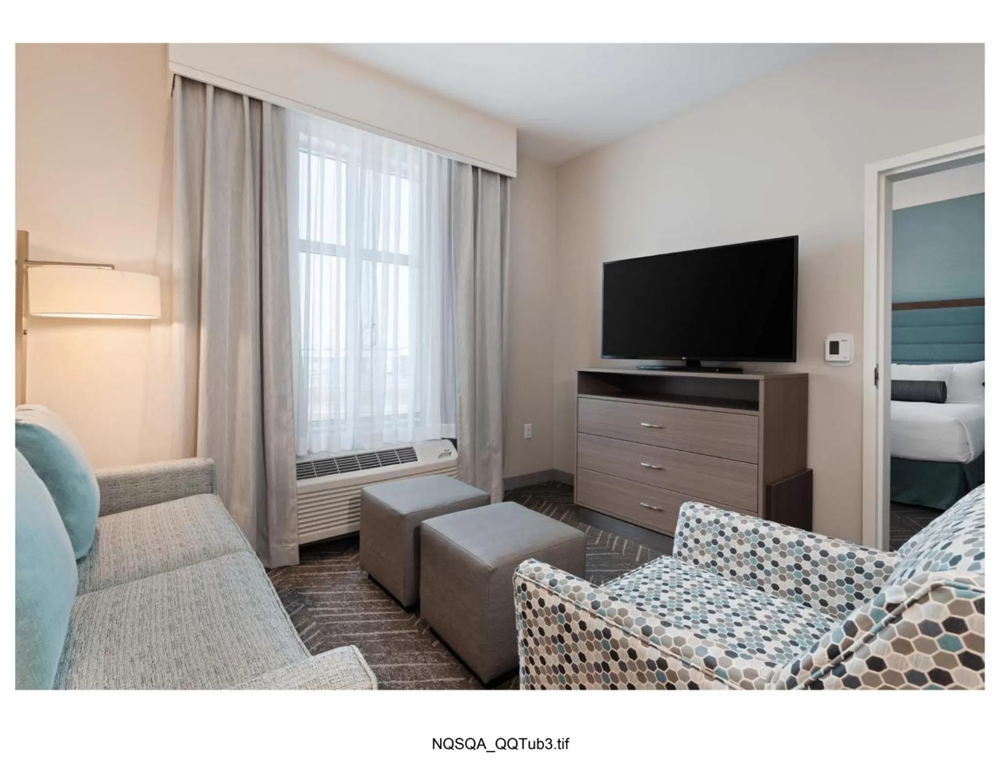 Living room, Bed in Homewood Suites By Hilton Panama City Beach, Fl