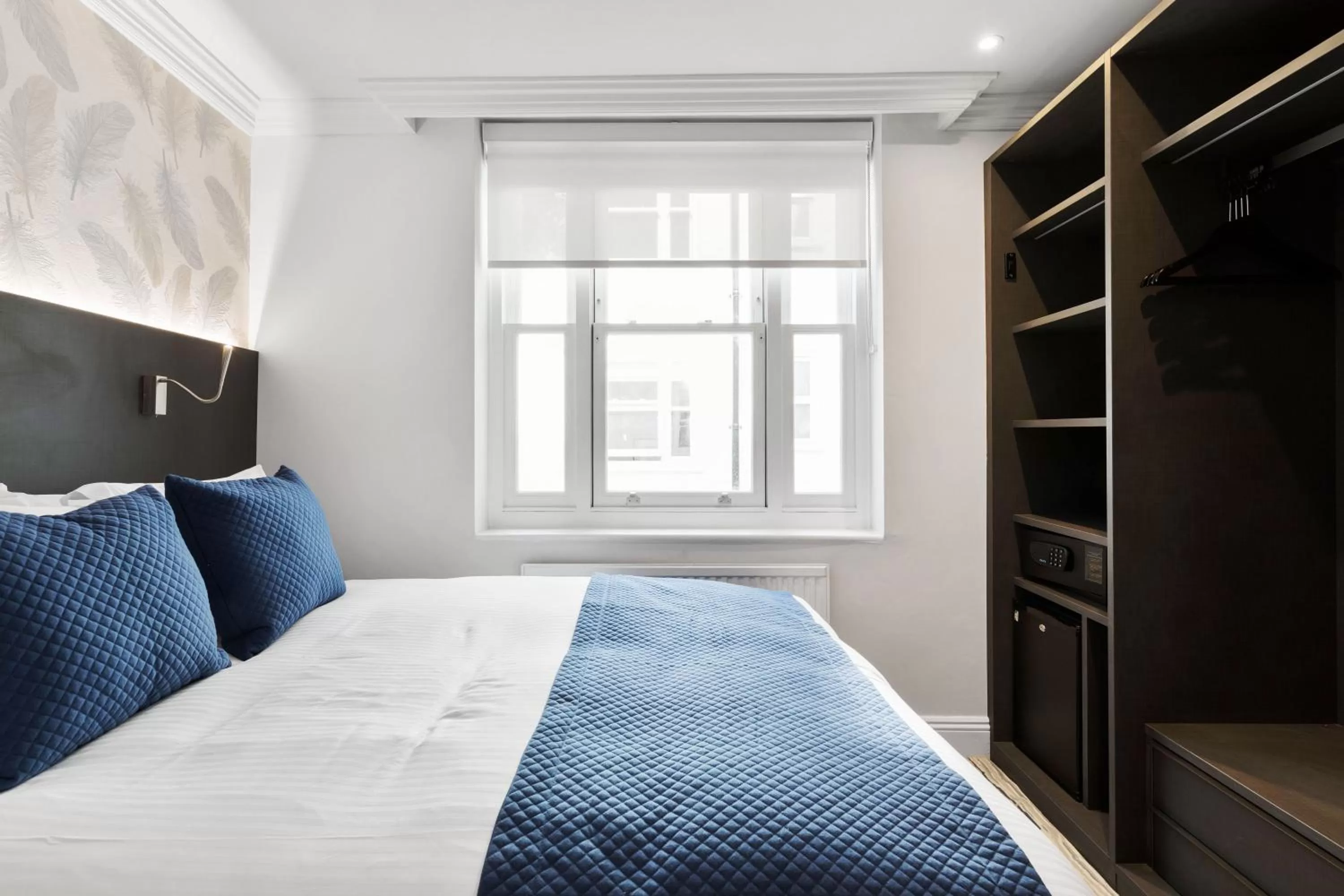 Bed in Commodore Hotel