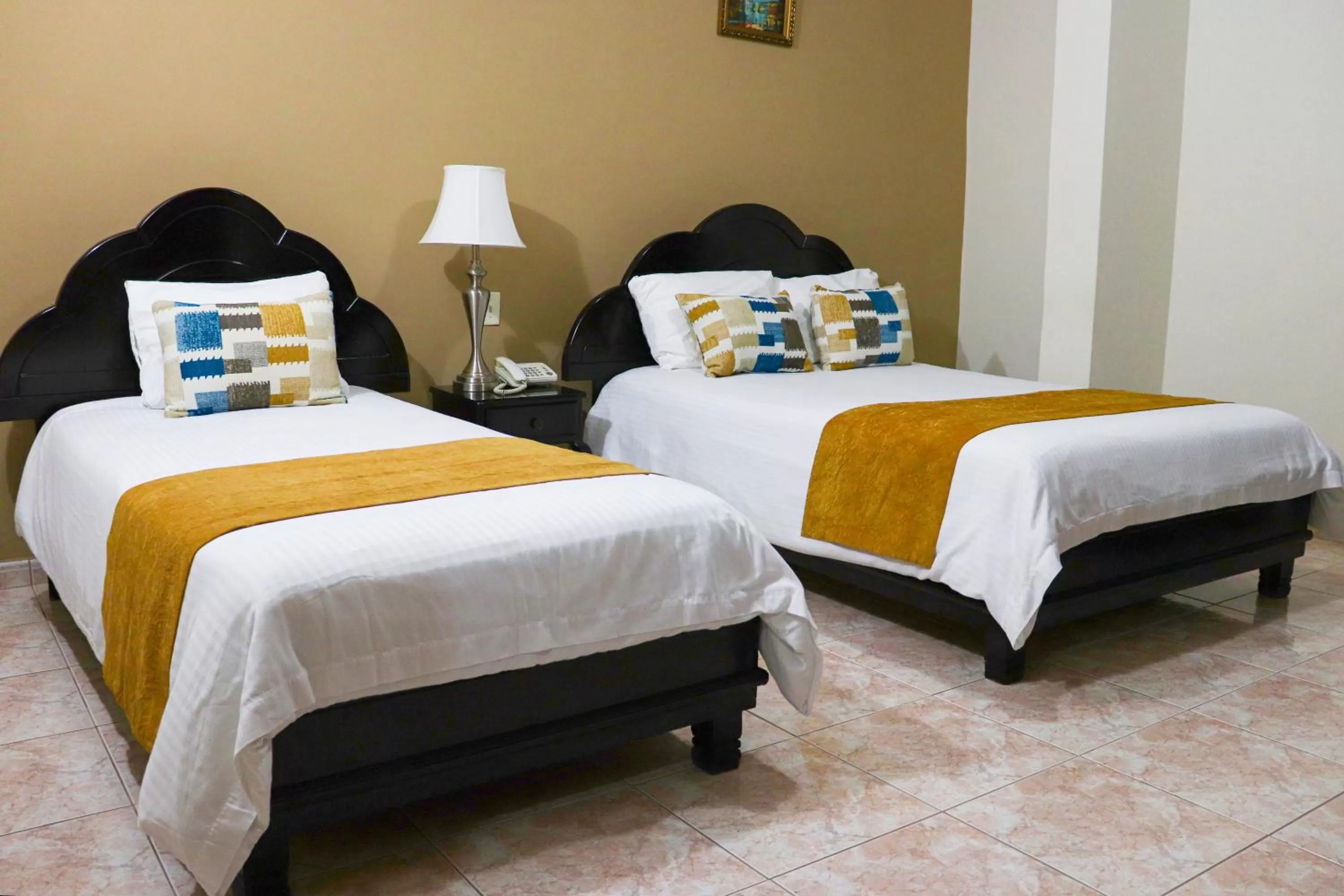 Bed in Hotel Puerta del Sol