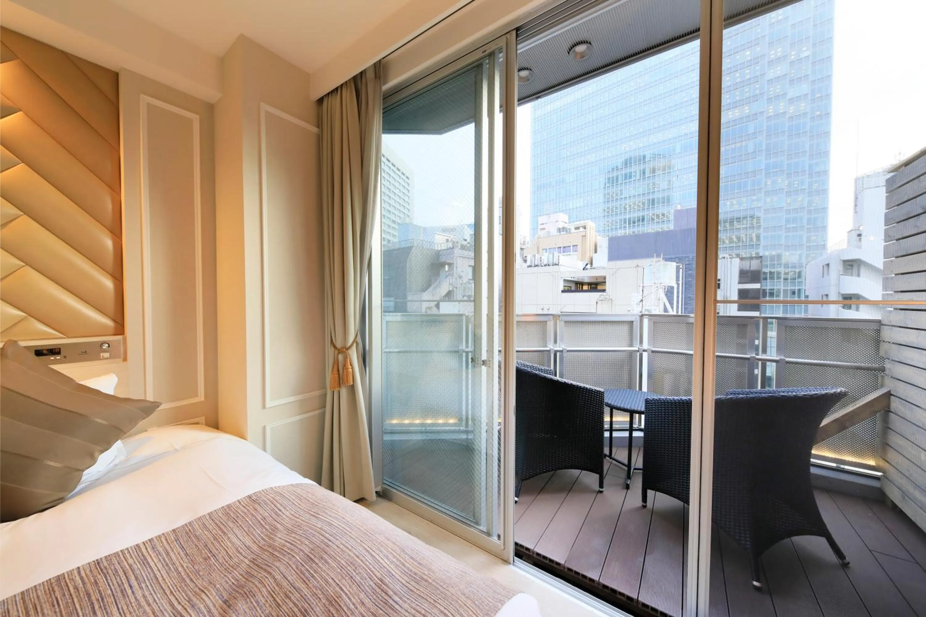 Photo of the whole room, Bed in Centurion Hotel Residential Akasaka Station