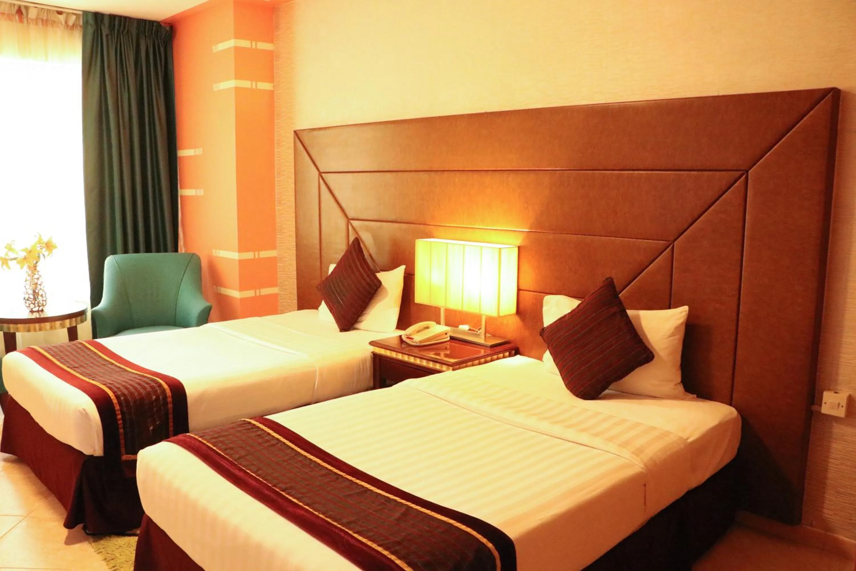 Bed in Al Manar Grand Hotel Apartment