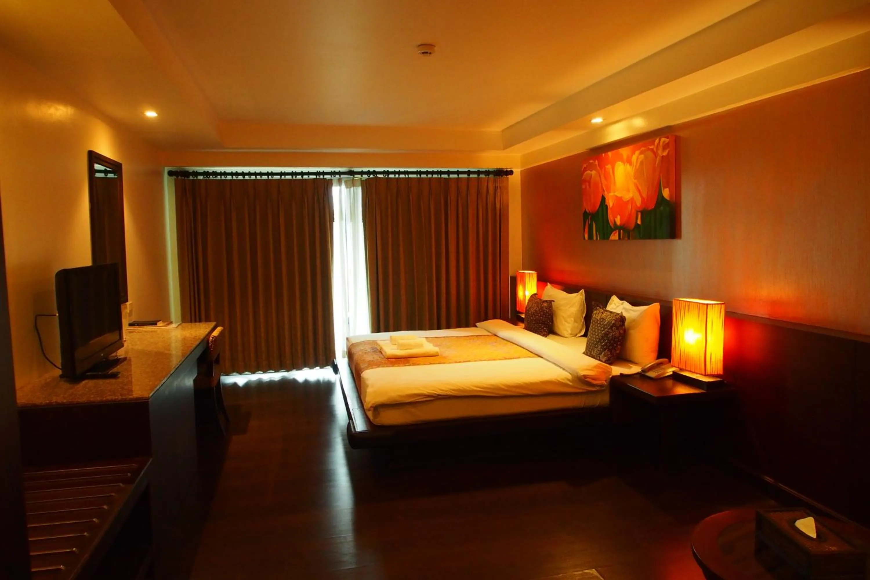 Photo of the whole room, Bed in Baan Suwantawe