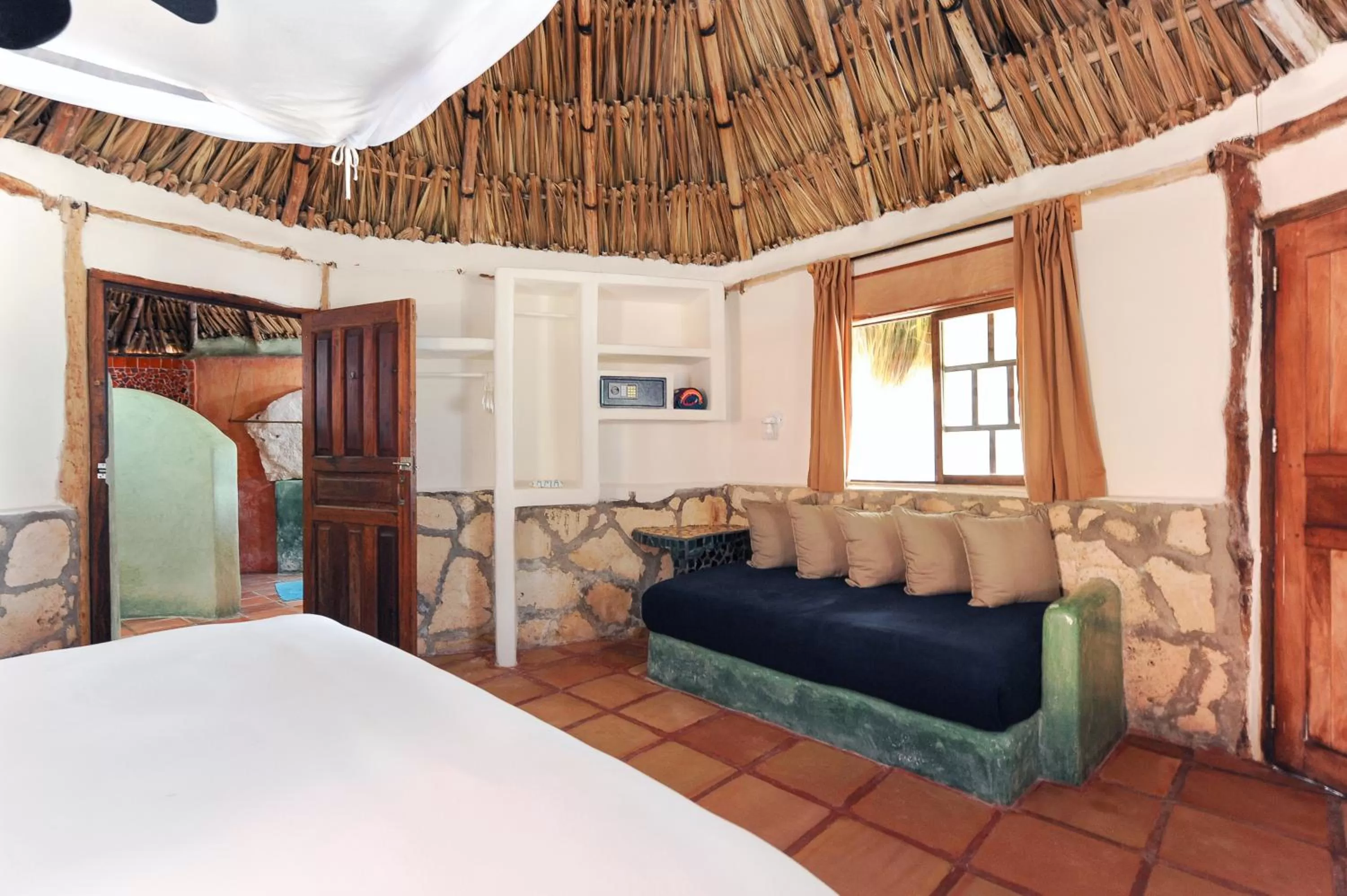 Seating area, Bed in Zamas Hotel