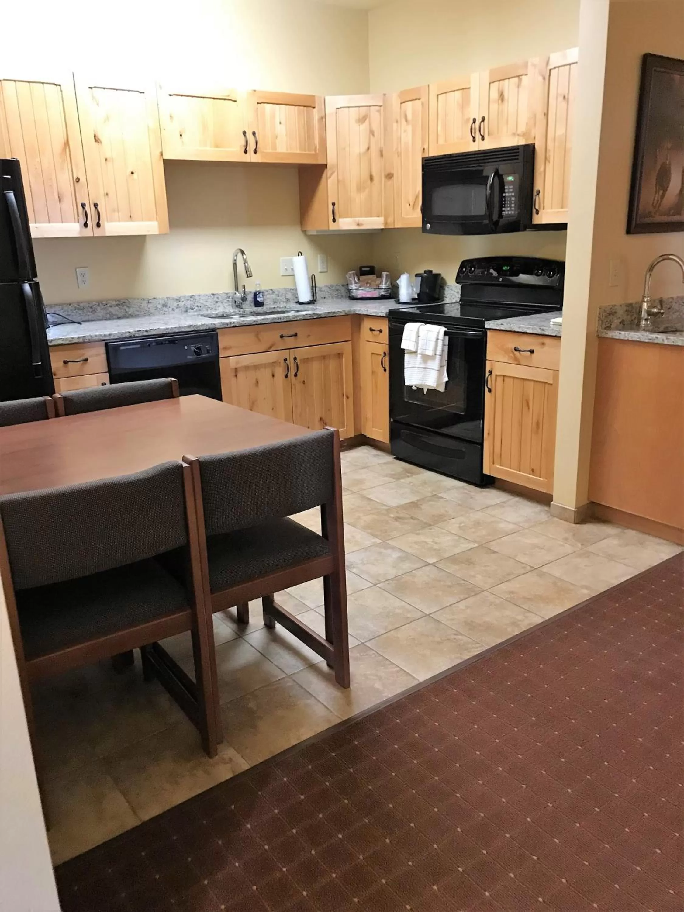 Kitchen or kitchenette in AmericInn by Wyndham Fargo Medical Center