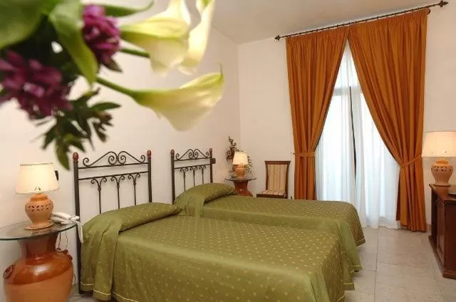 Bed in Grikò Country Hotel