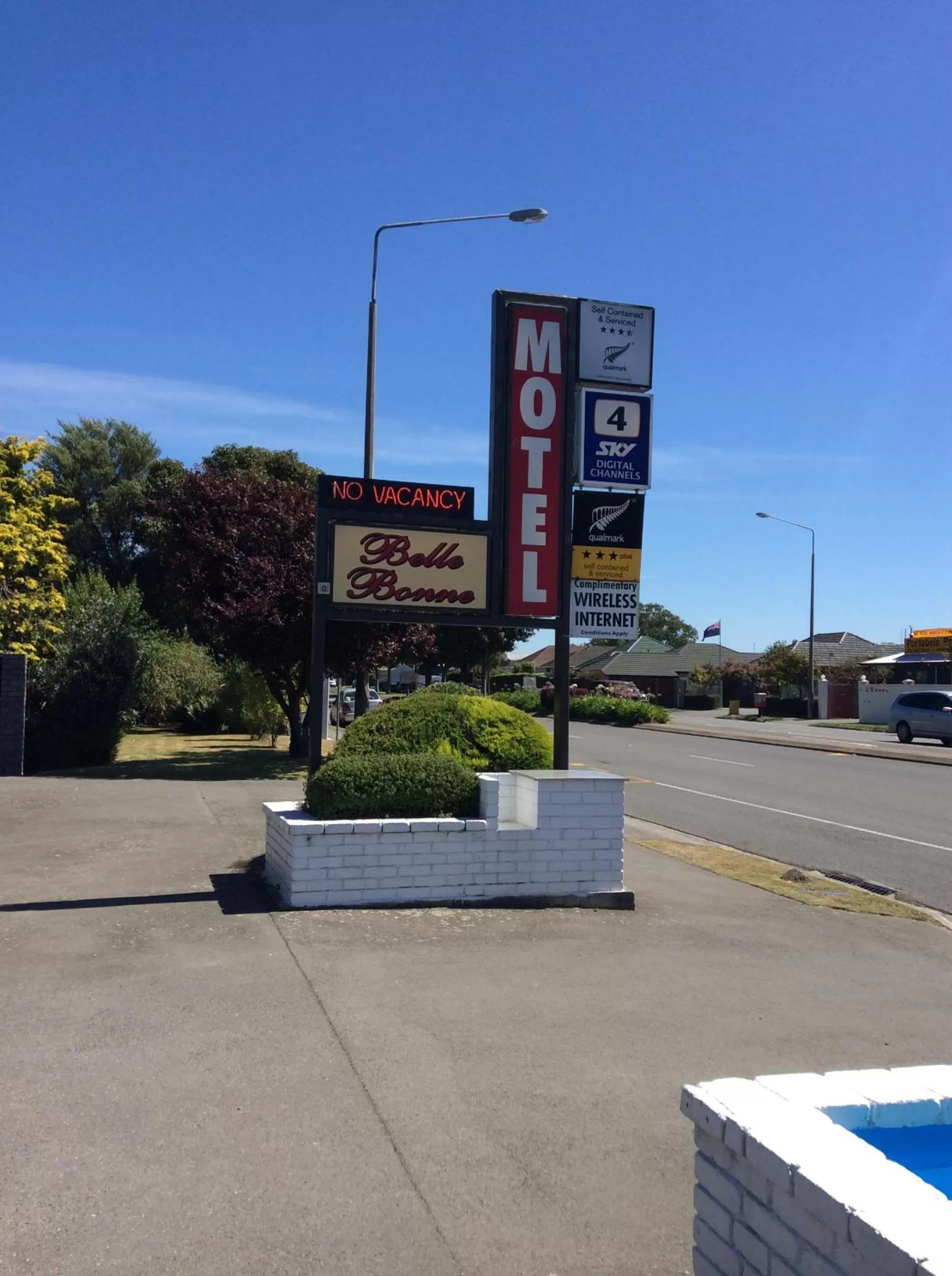 Property logo or sign in Belle Bonne Motel