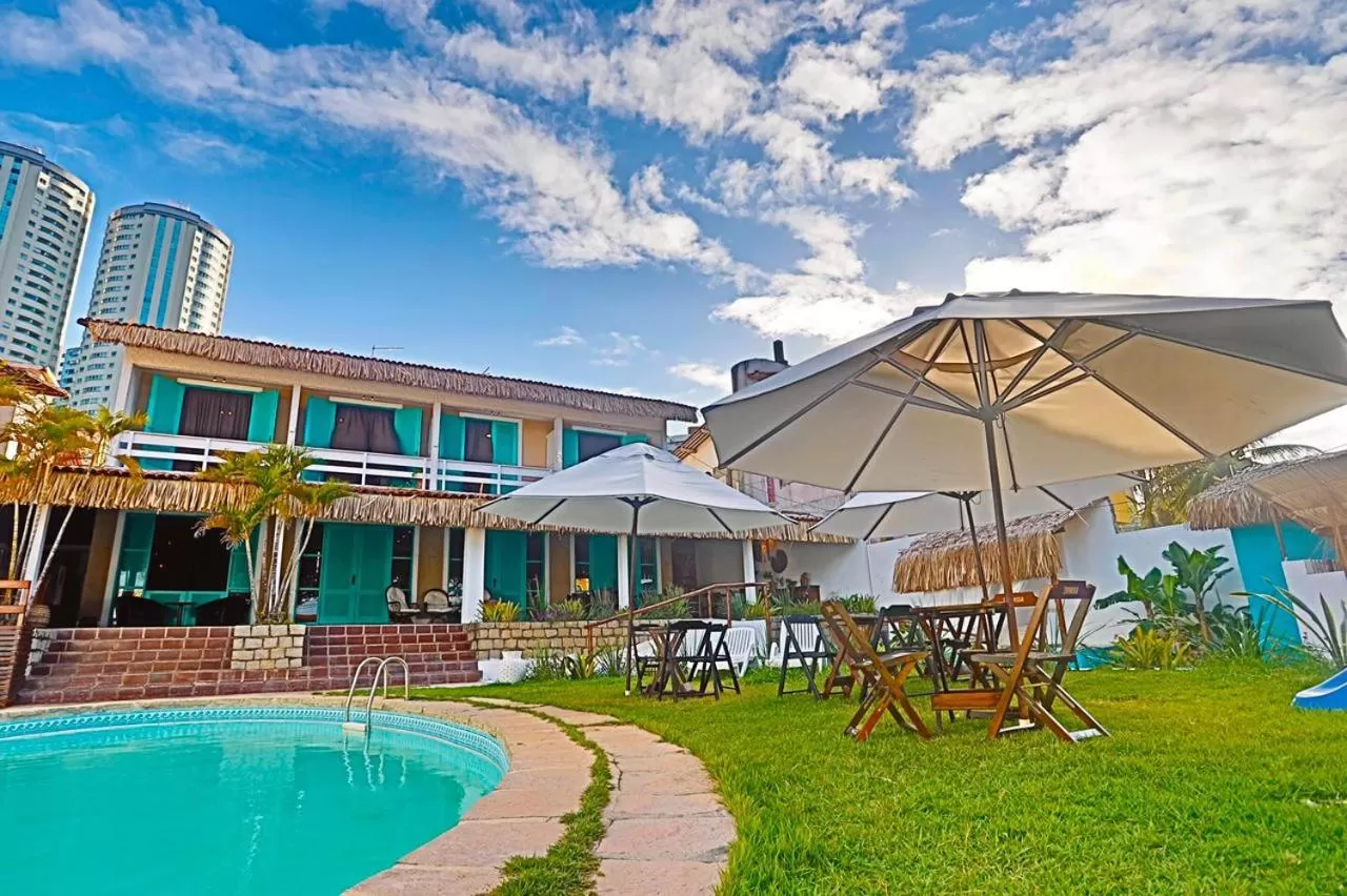 Property building, Swimming Pool in Pousada Ponta Mar