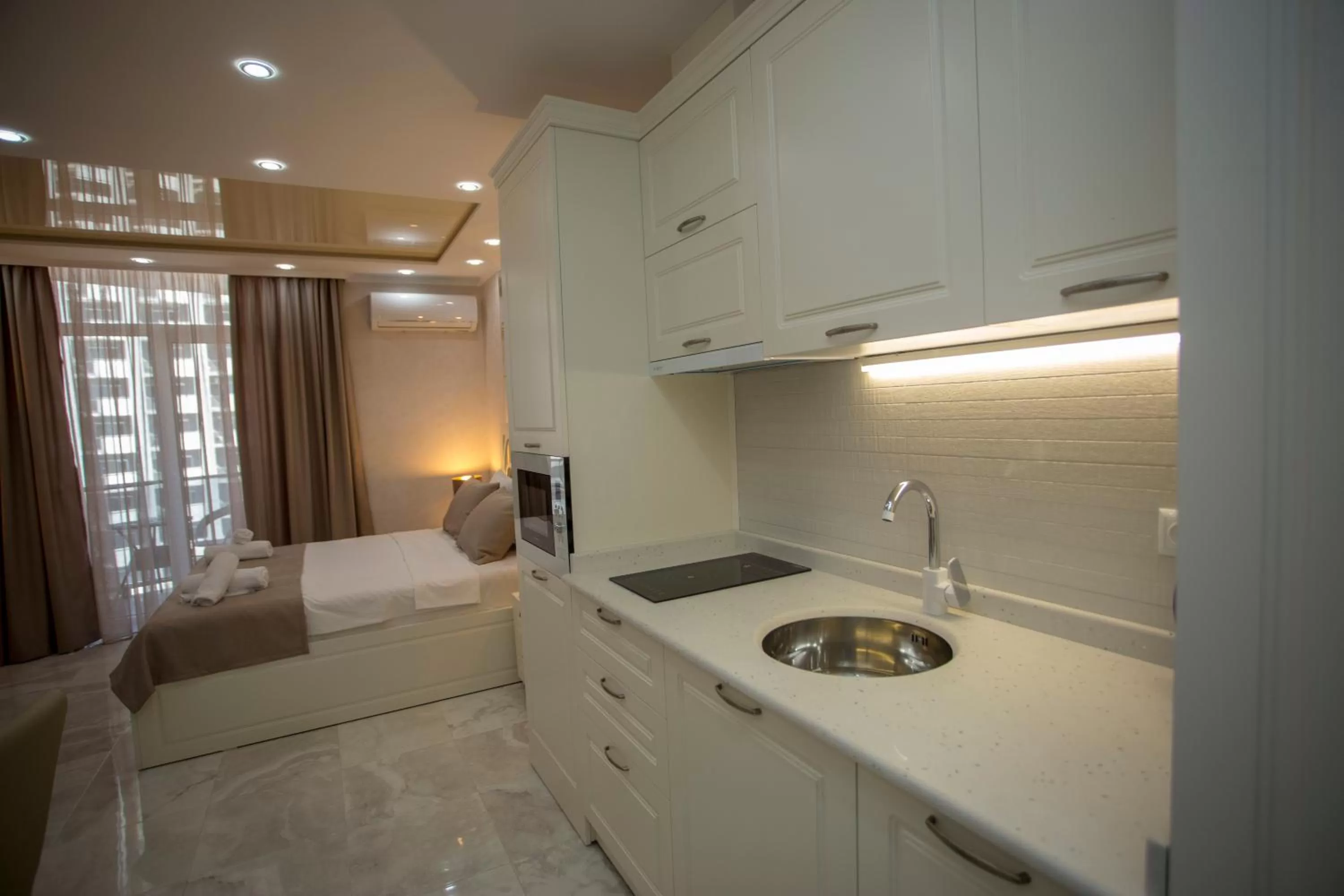 Kitchen or kitchenette, Bed in Blue Star Batumi