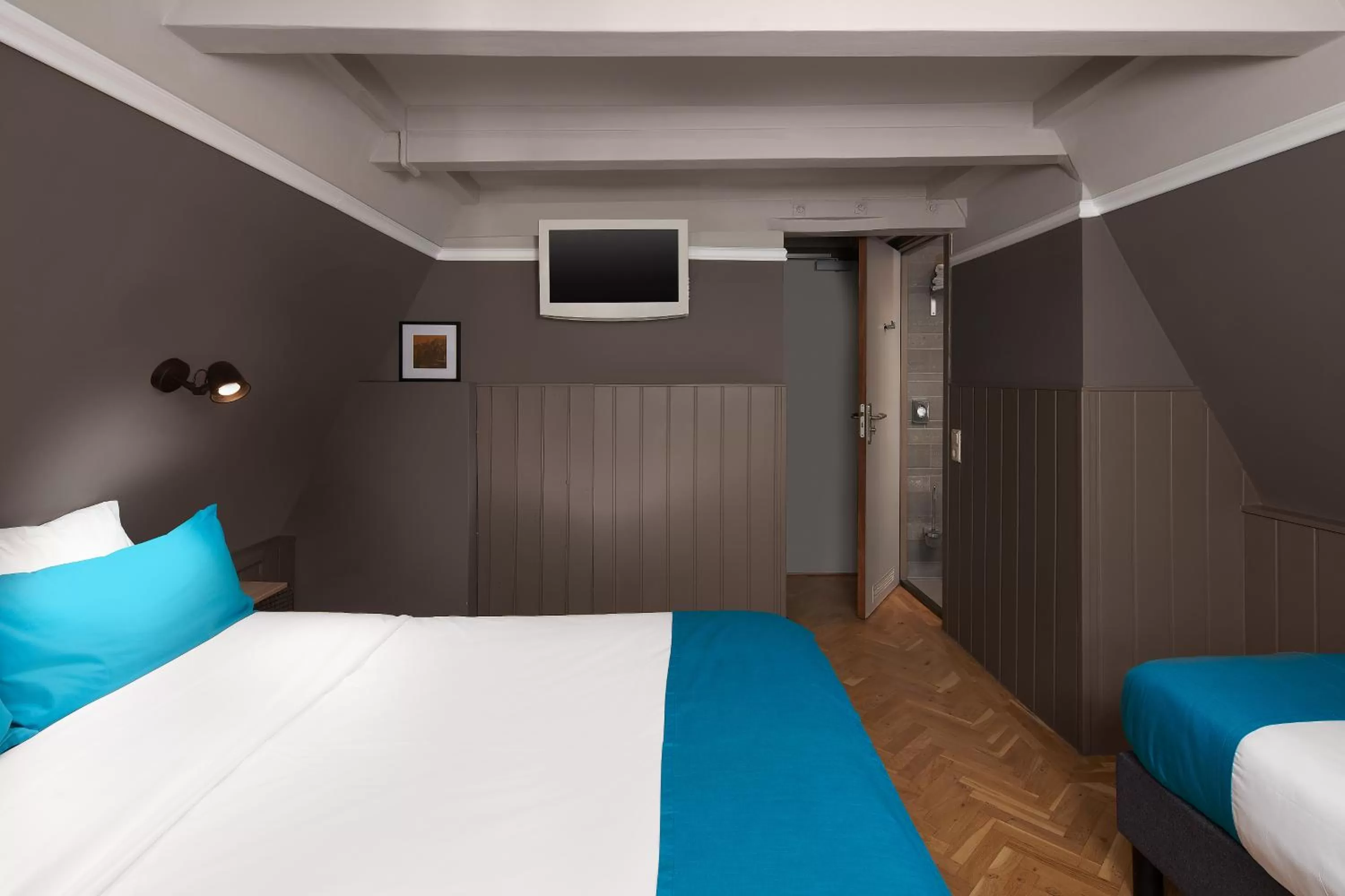 Bed in Stanley Collection Hotel Hegra Amsterdam