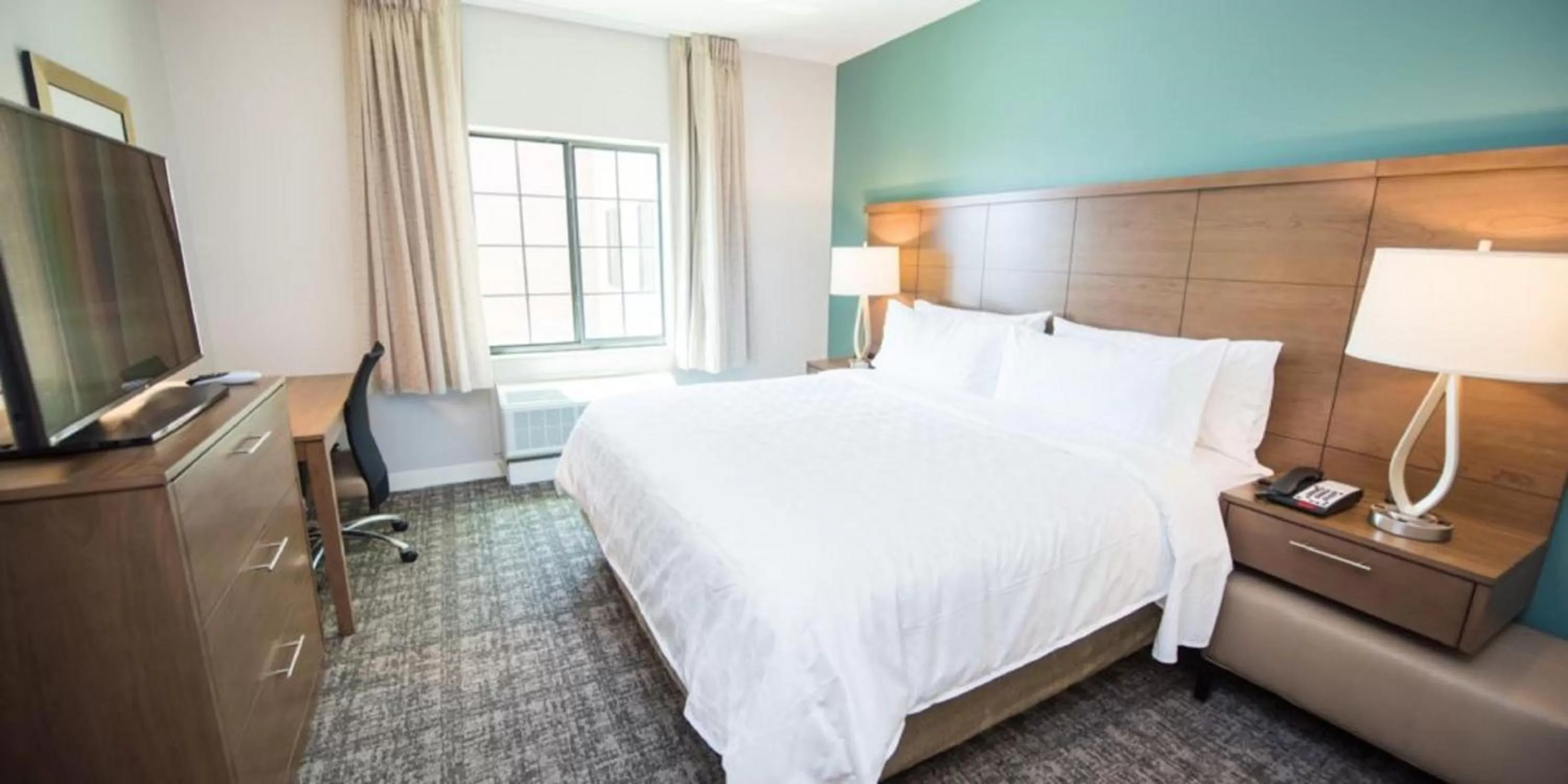 Photo of the whole room, Bed in Staybridge Suites Houston East - Baytown by IHG