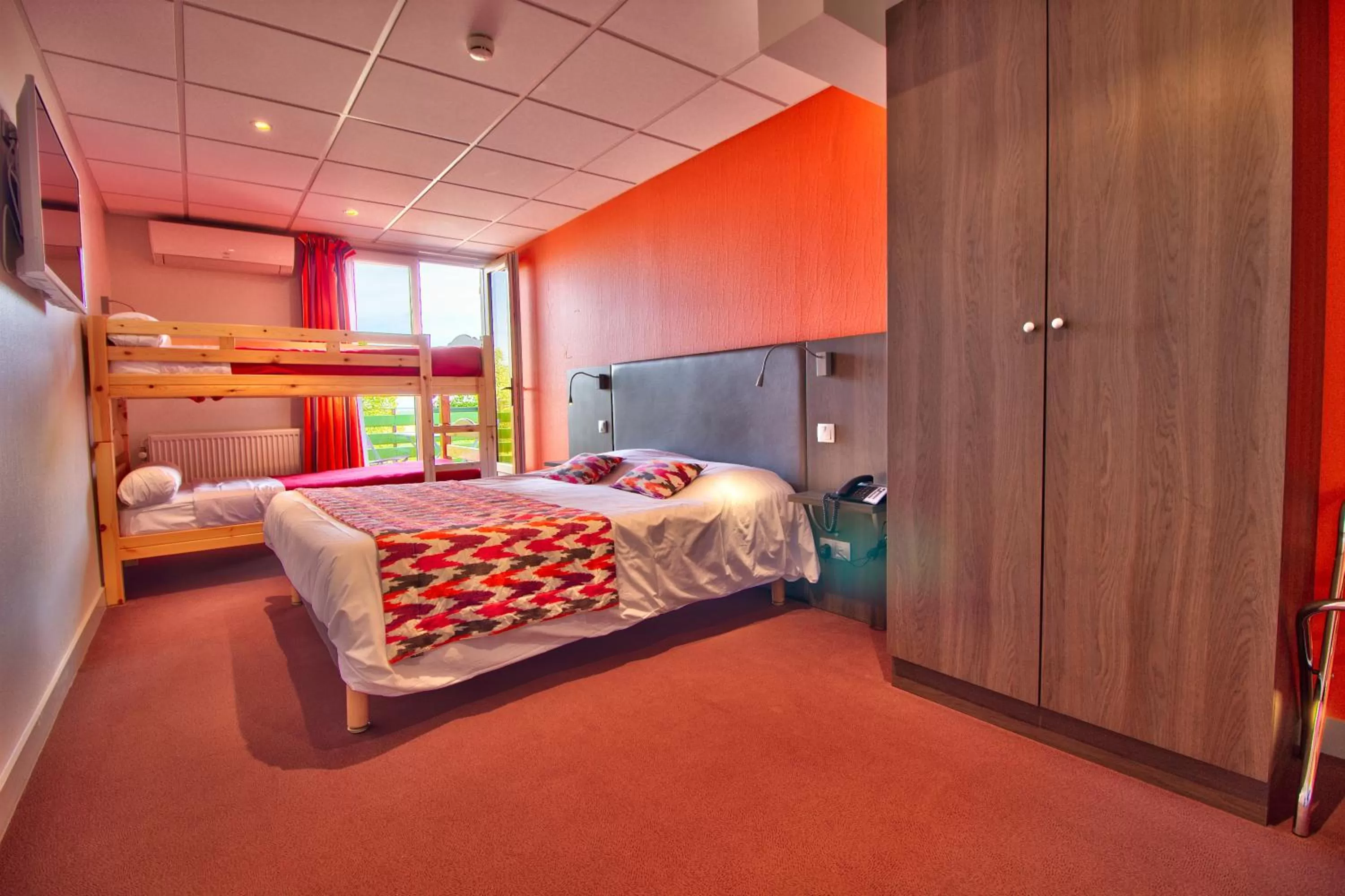 Bed in Logis Hôtel Restaurant Le Chalet du Mont Roland