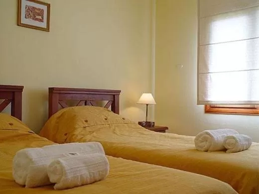 Bed in Hosteria Miyazato Inn