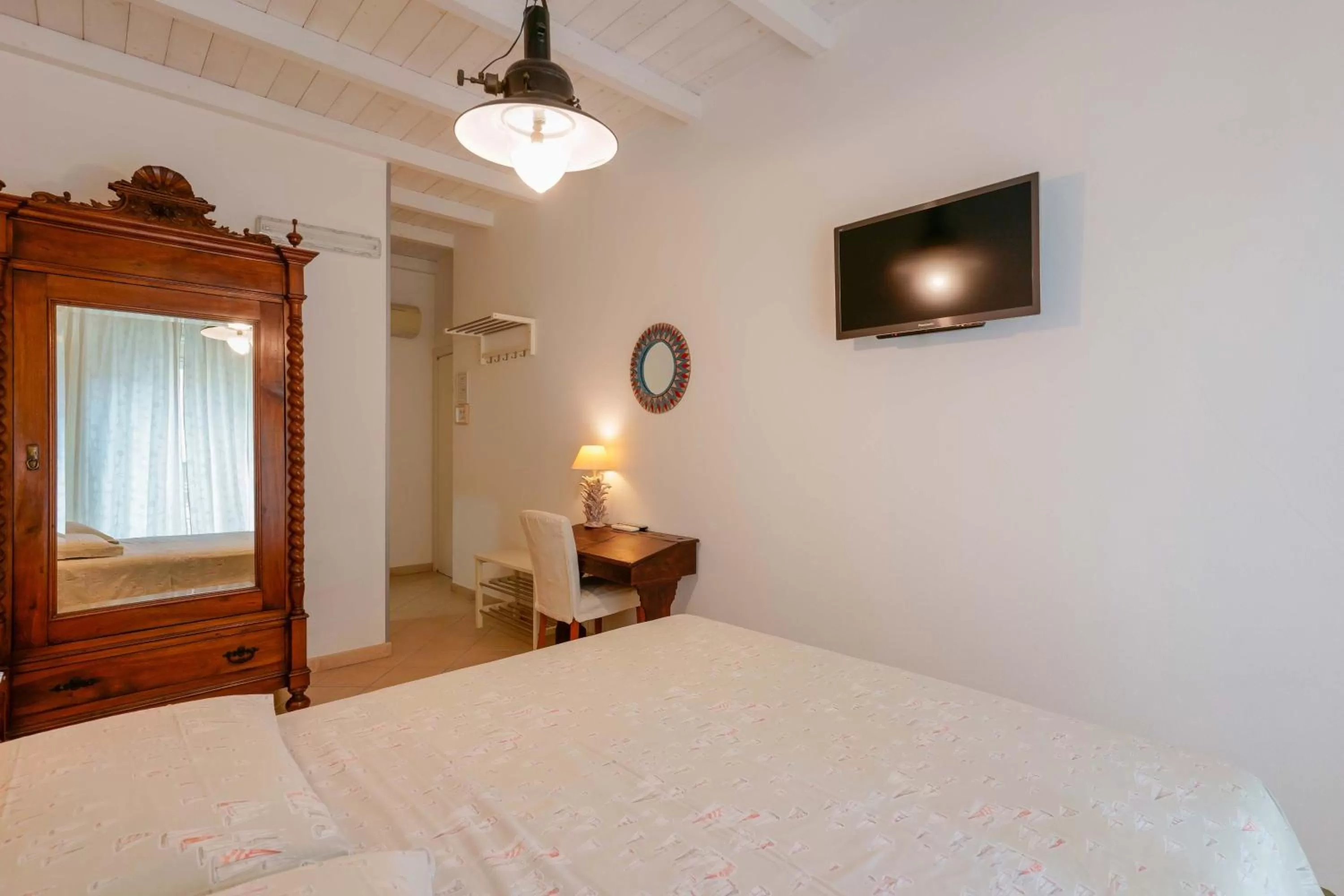 Bed, TV/Entertainment Center in Il Cagliarese B&B
