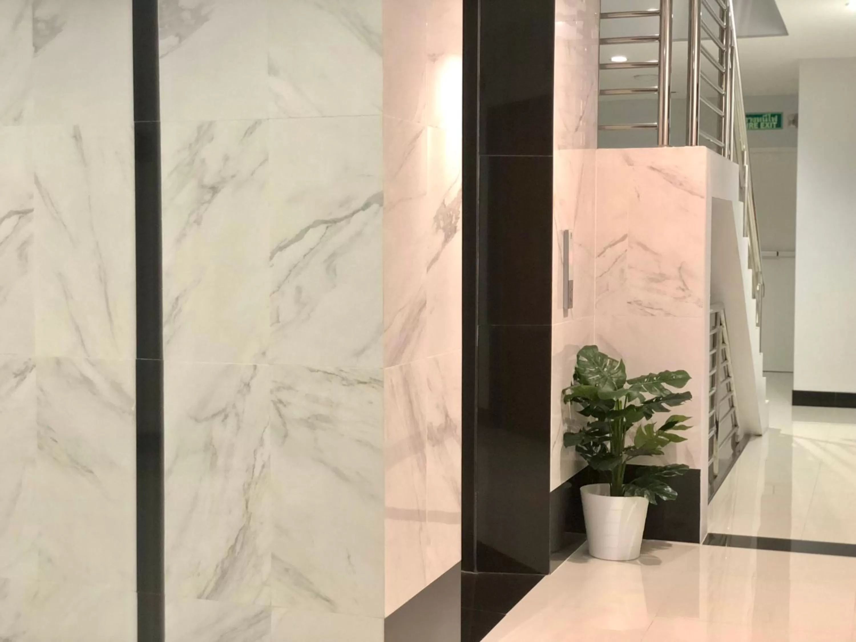 Property building in Well Timed Hotel