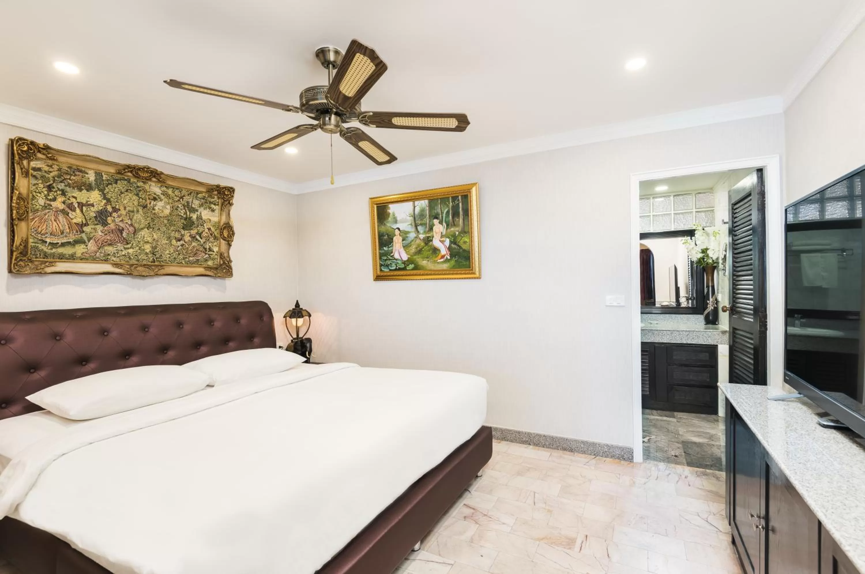 Bed in The Ambiance Hotel