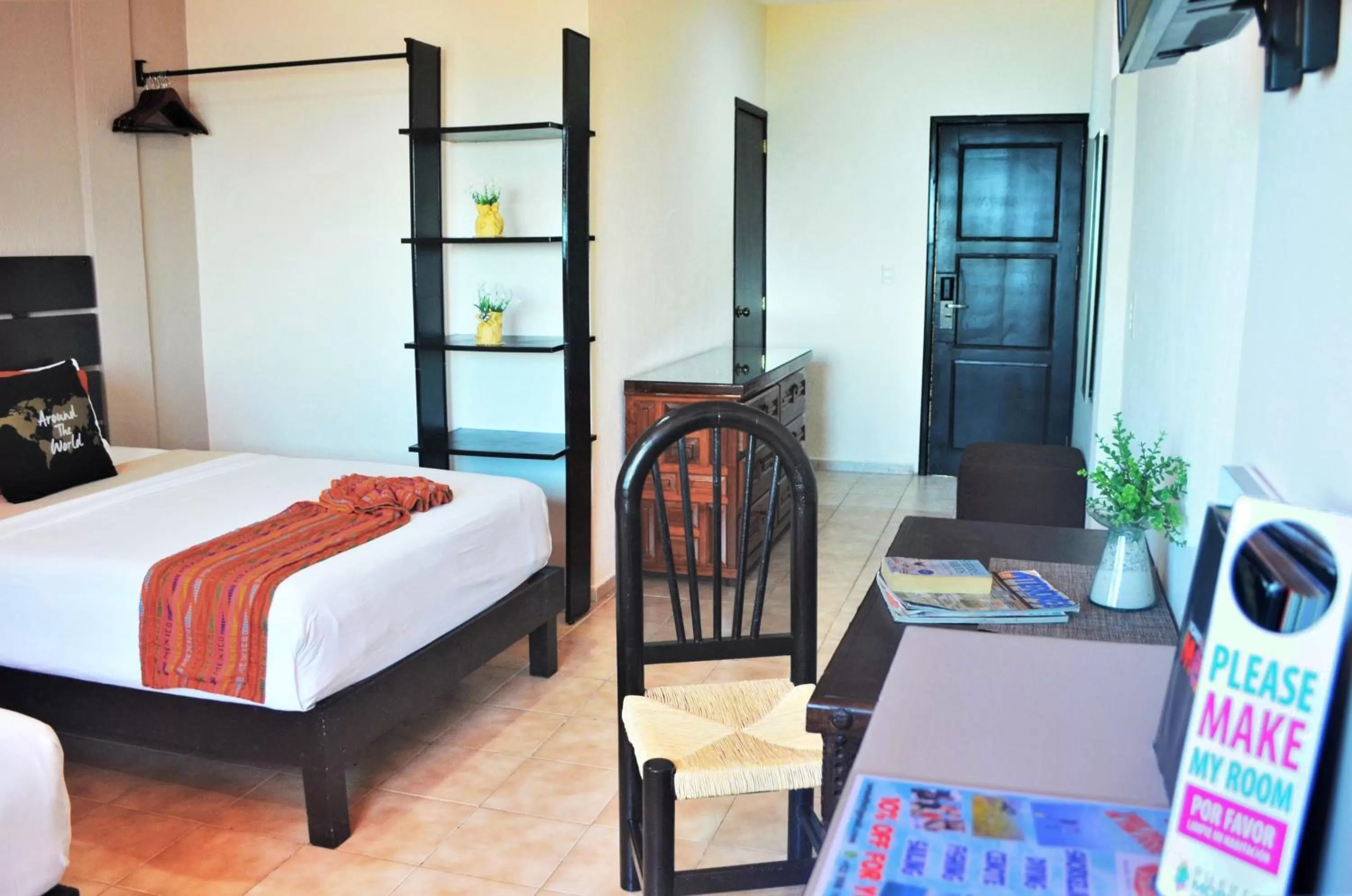 Photo of the whole room, Bed in Hacienda Morelos Beachfront Hotel