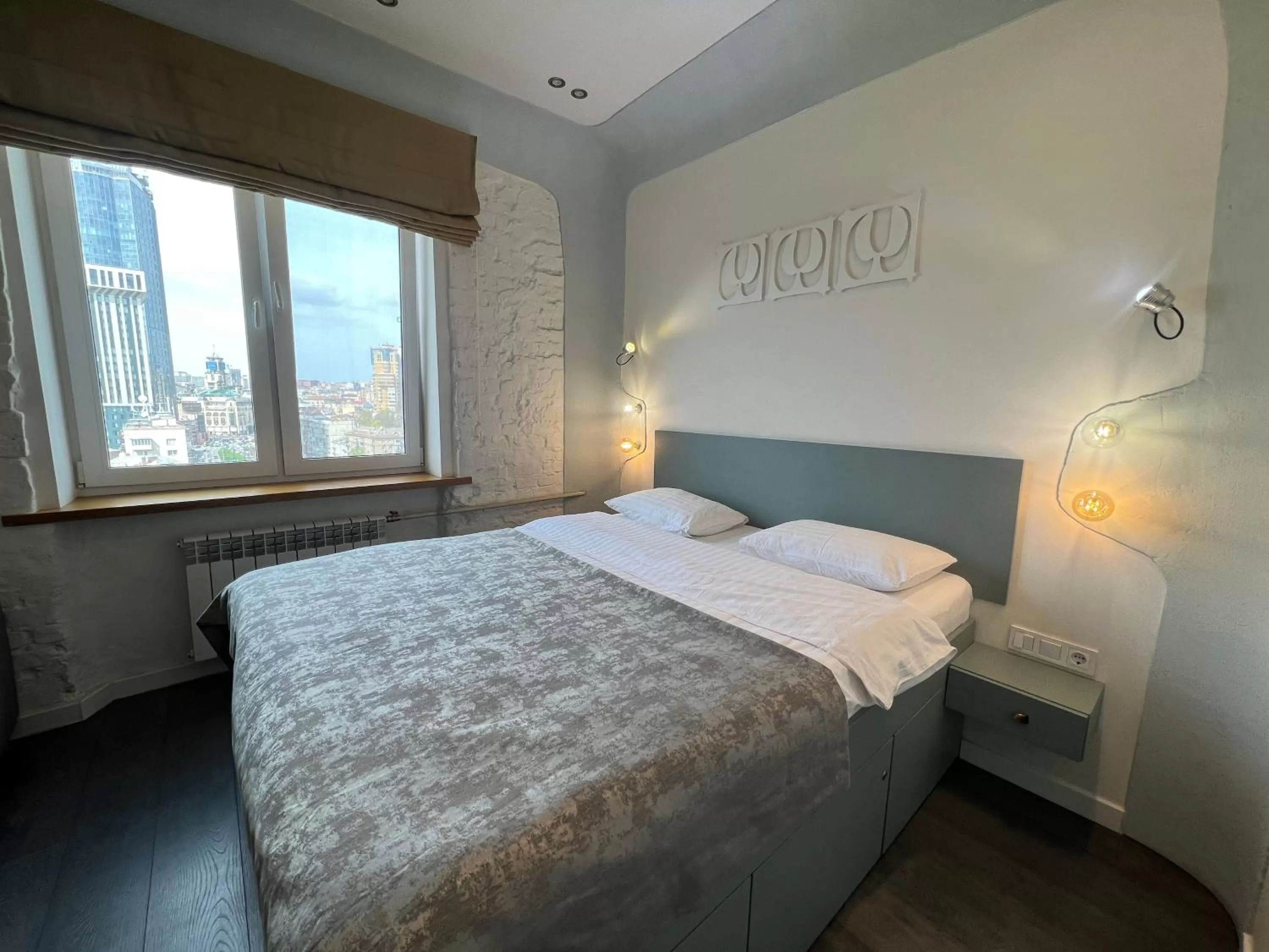 Bedroom, Bed in Kyiv Panorama Apartments near Gulliver