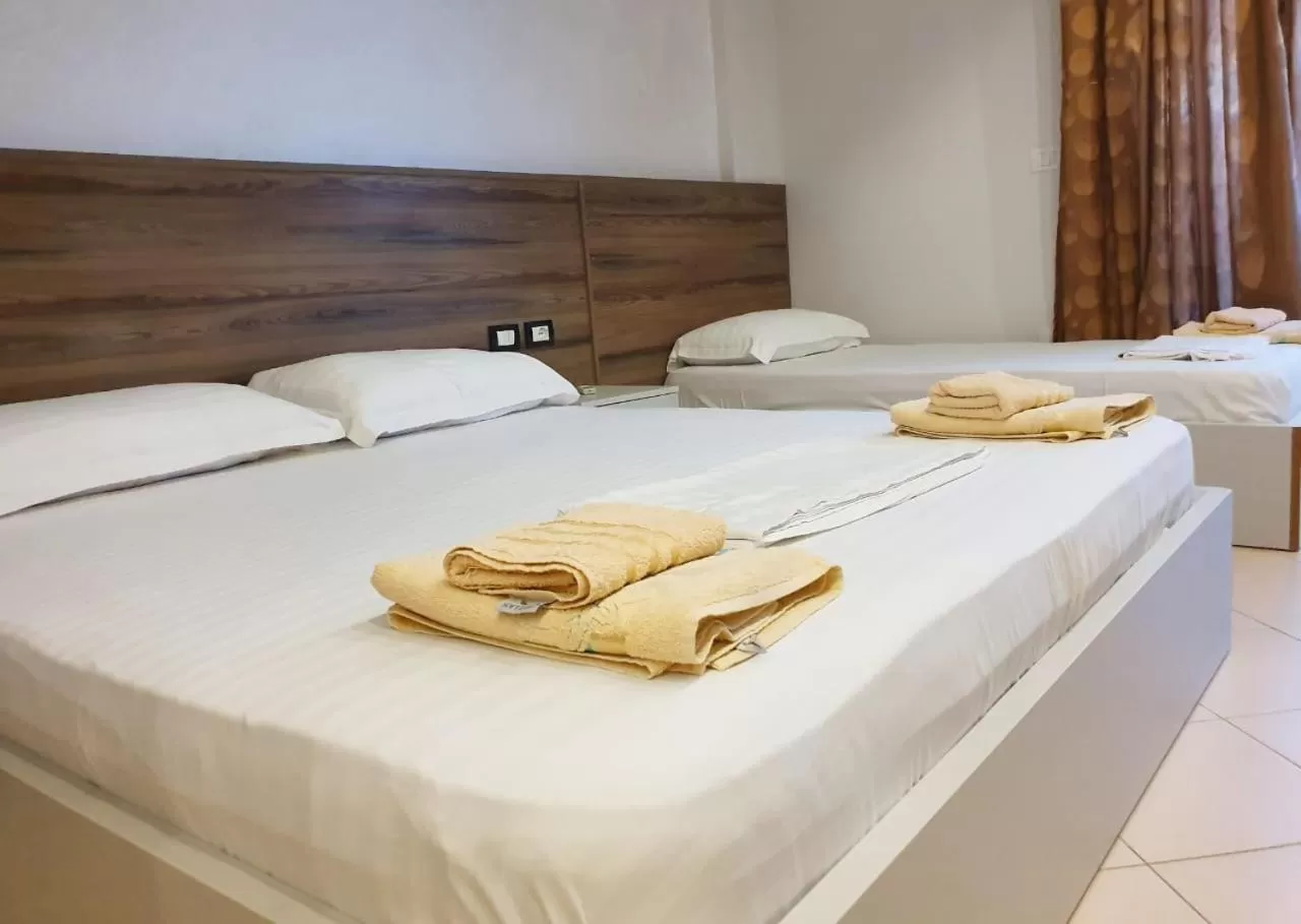 Bed in Hotel Kamomil