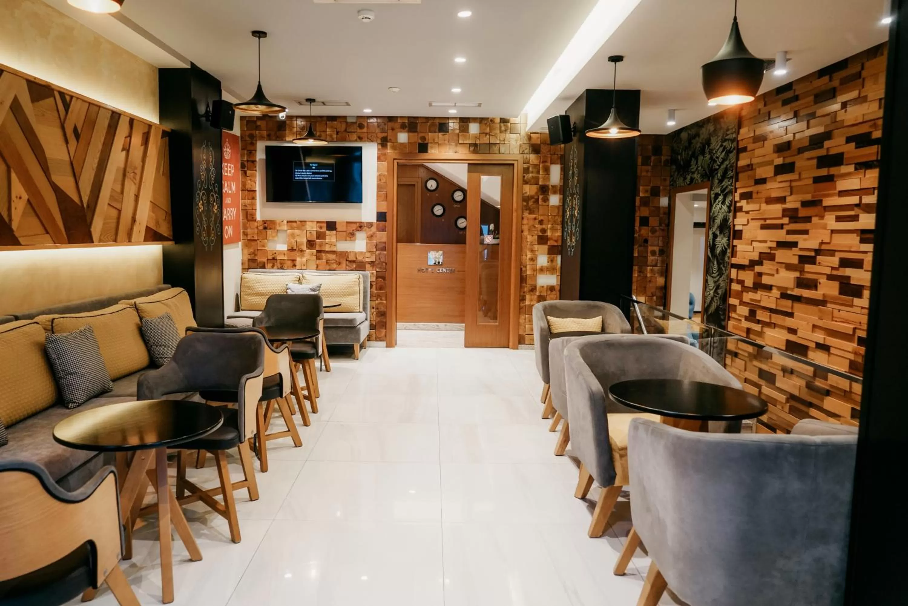 Communal lounge/ TV room, Lounge/Bar in Center Hotel