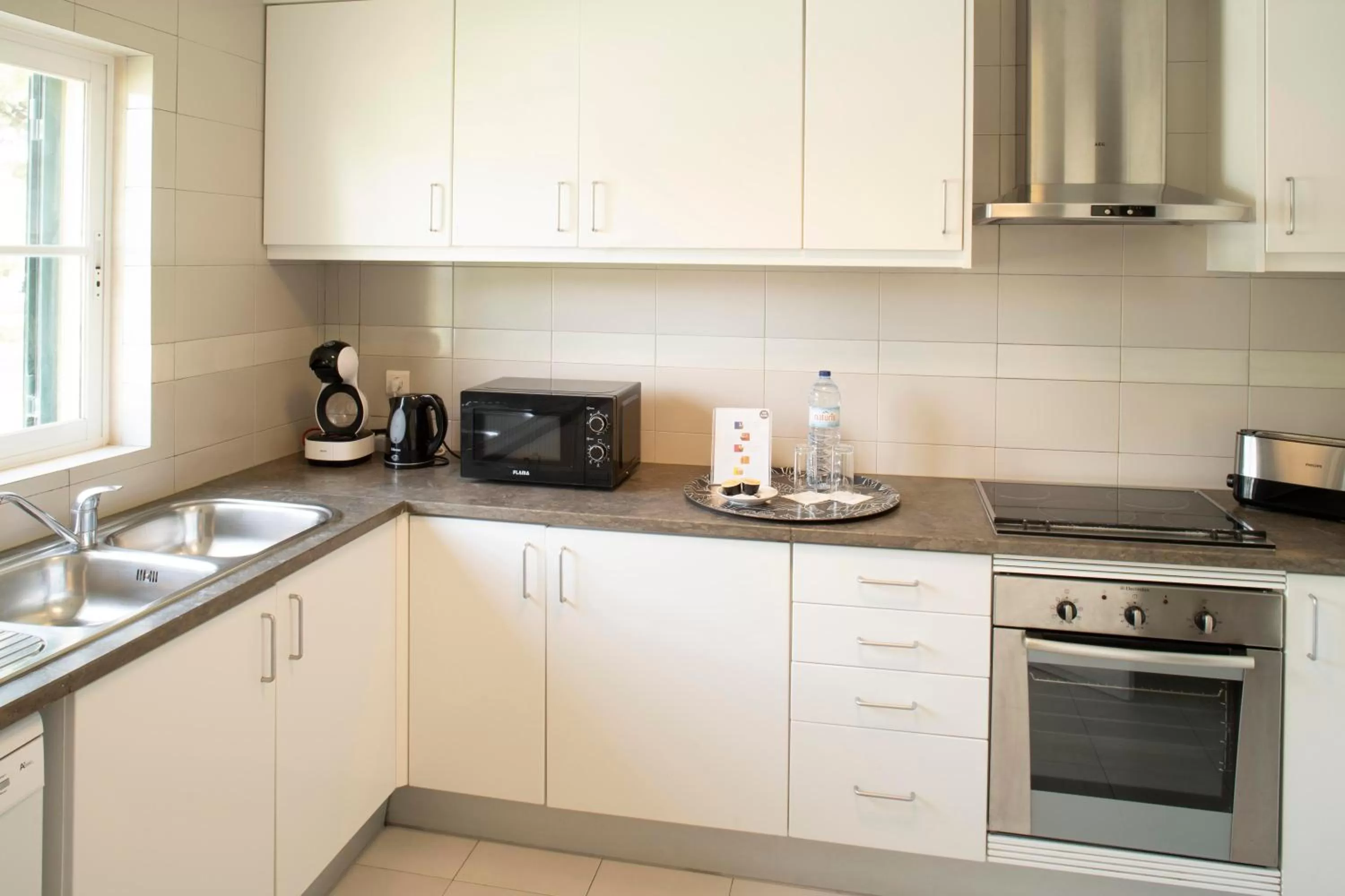 Kitchen or kitchenette in Vila Bicuda Resort