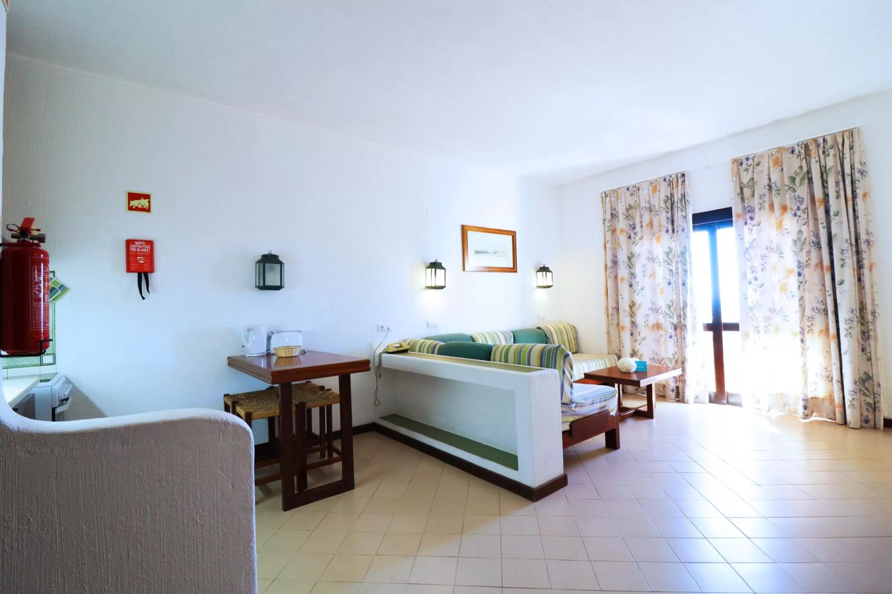 Living room, Bed in Bellavista Jardim By BeGuest