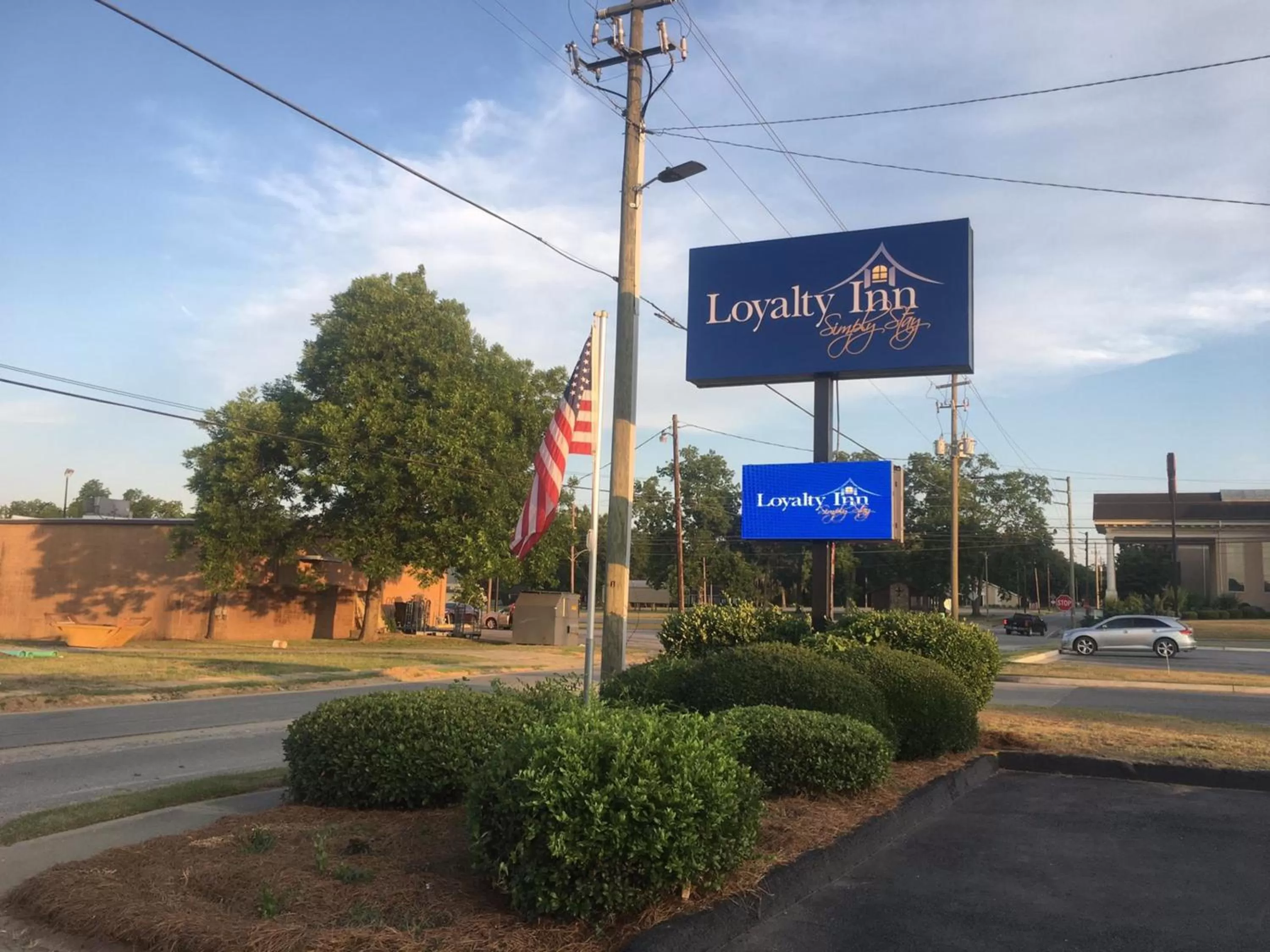 Property logo or sign in Loyalty Inn Hawkinsville
