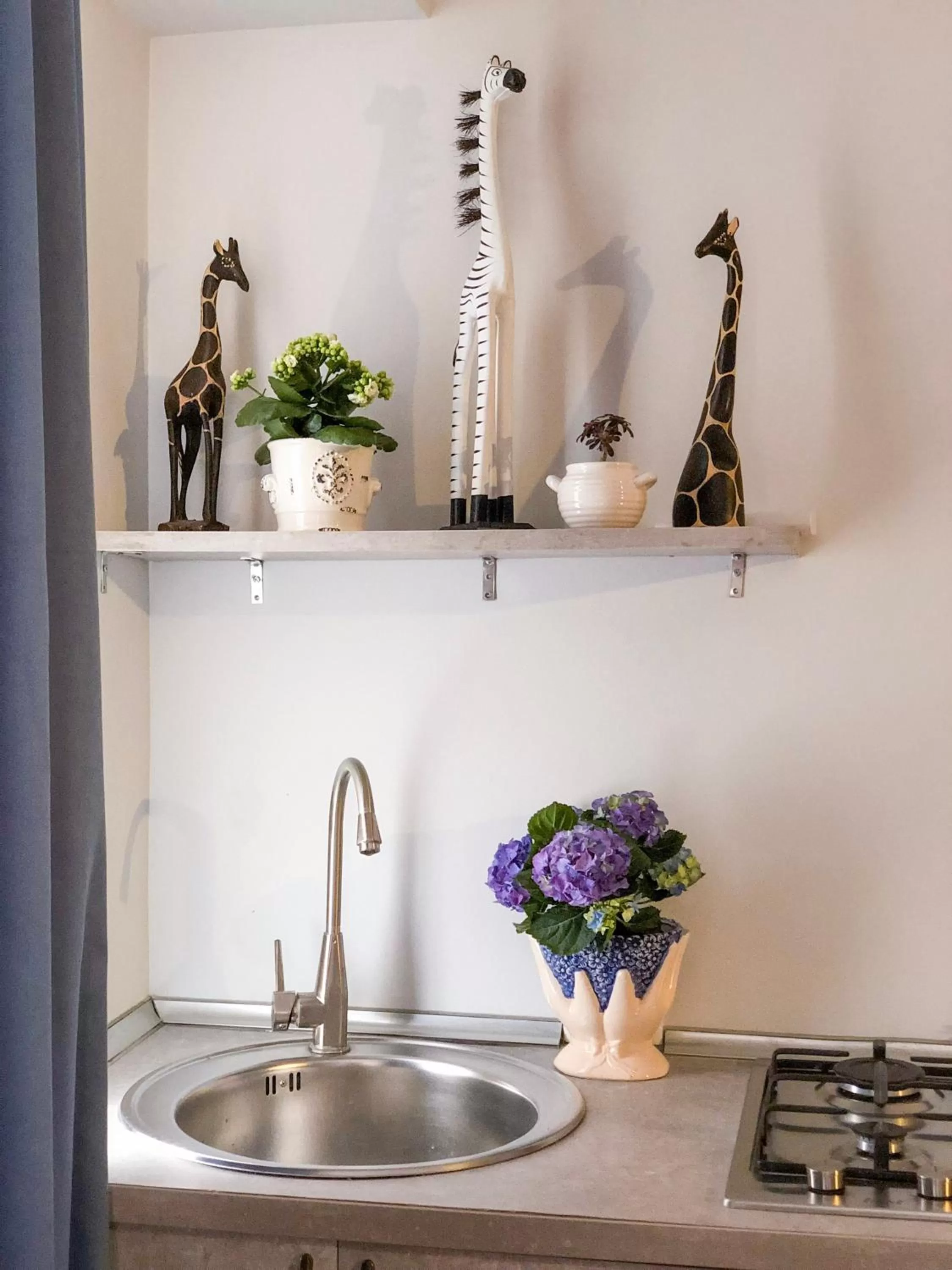 Kitchen or kitchenette in Check Point Hotel