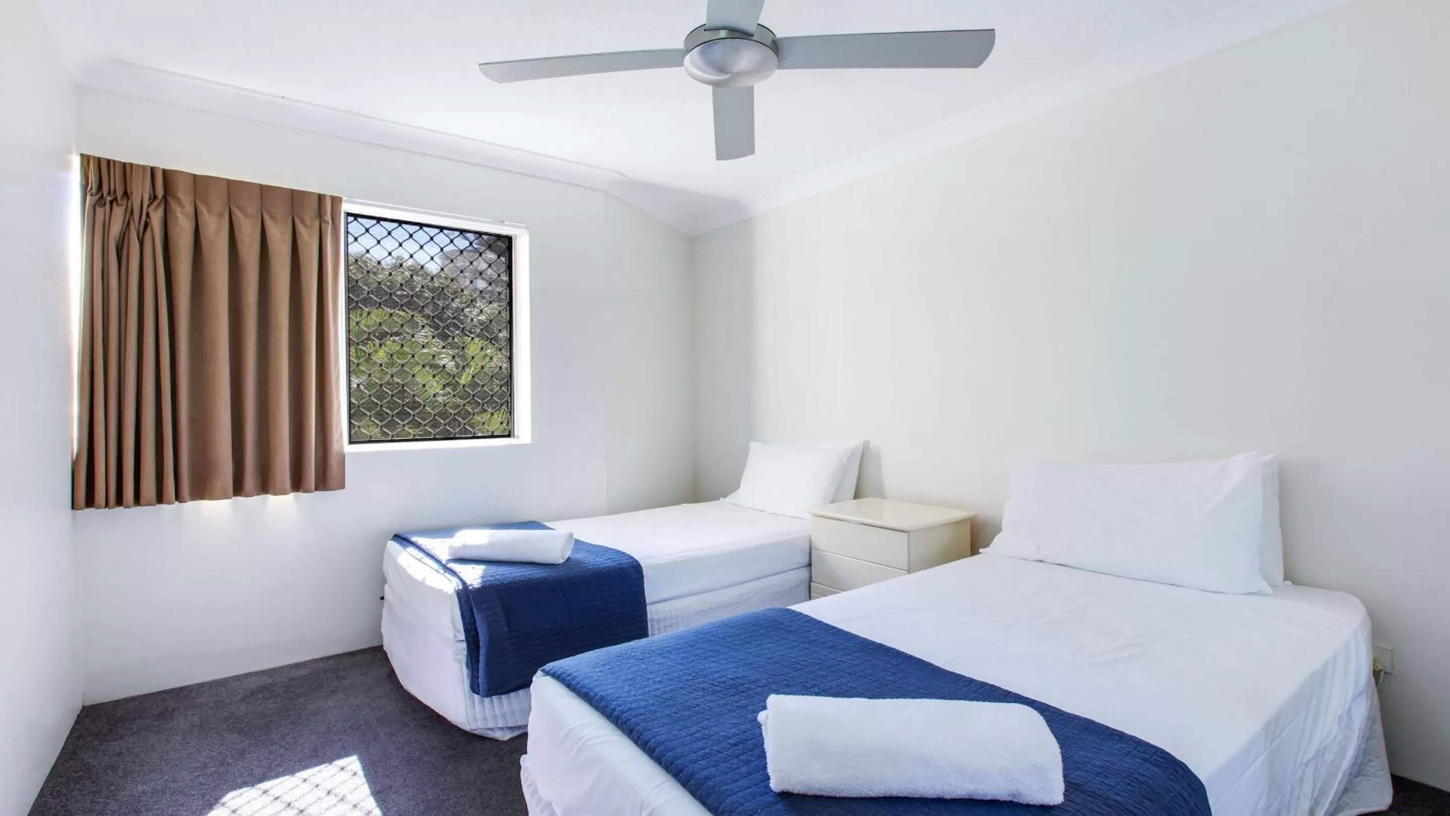 Bed in Mari Court Resort