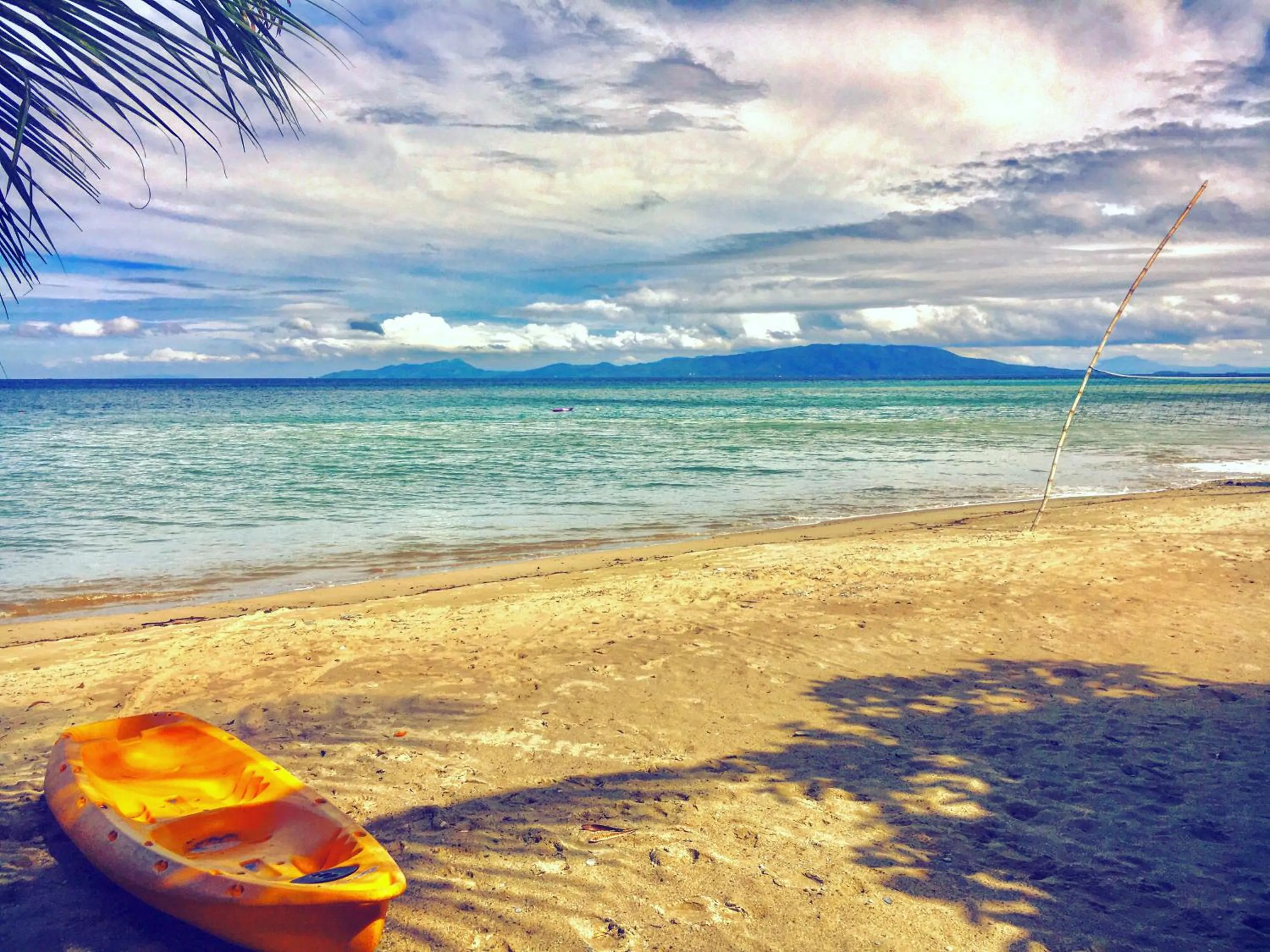 Beach in Sunset At Aninuan Beach Resort